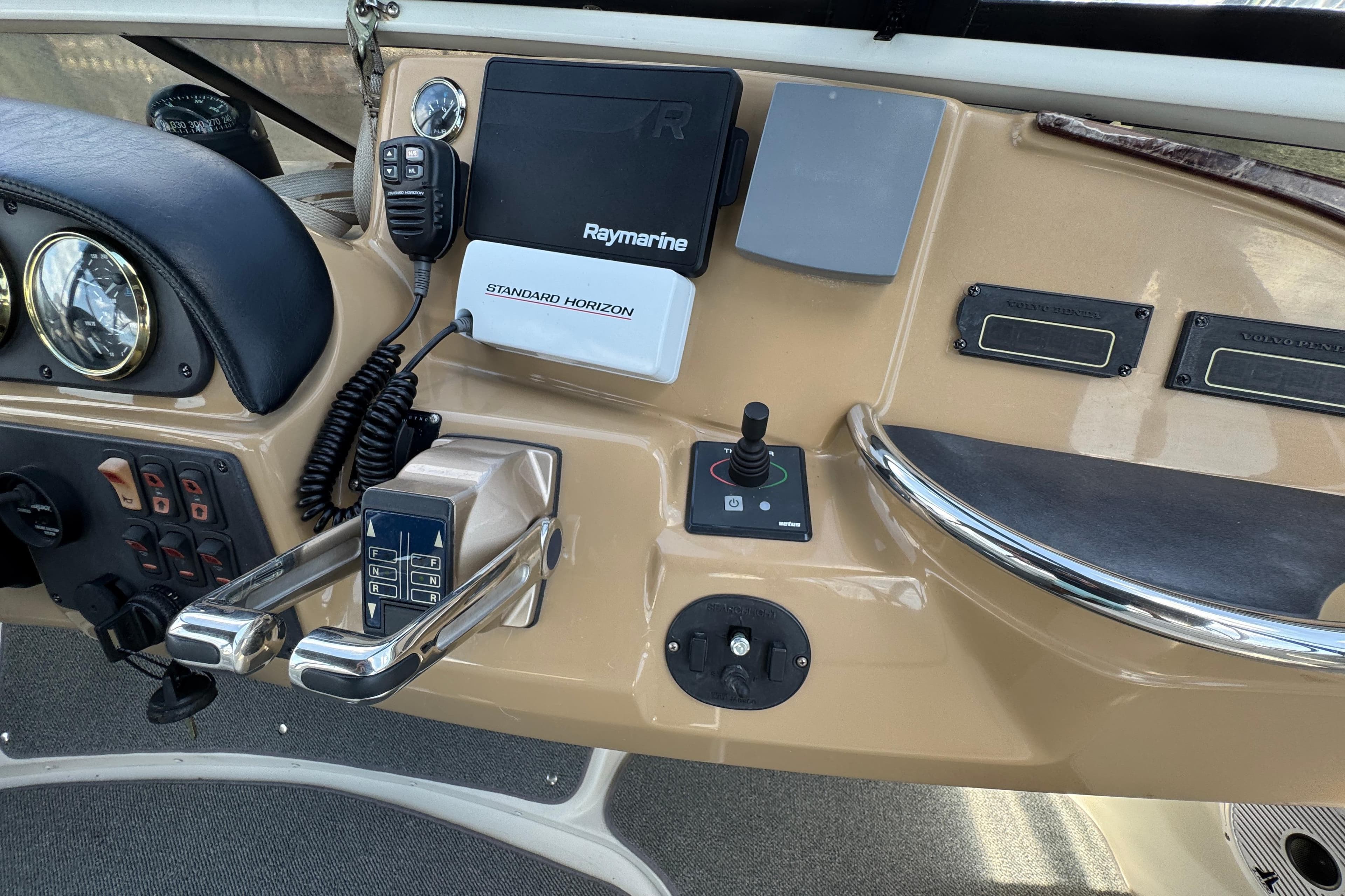 Control panel of 2004 Carver 444 Cockpit Motor Yacht with navigation and communication equipment.