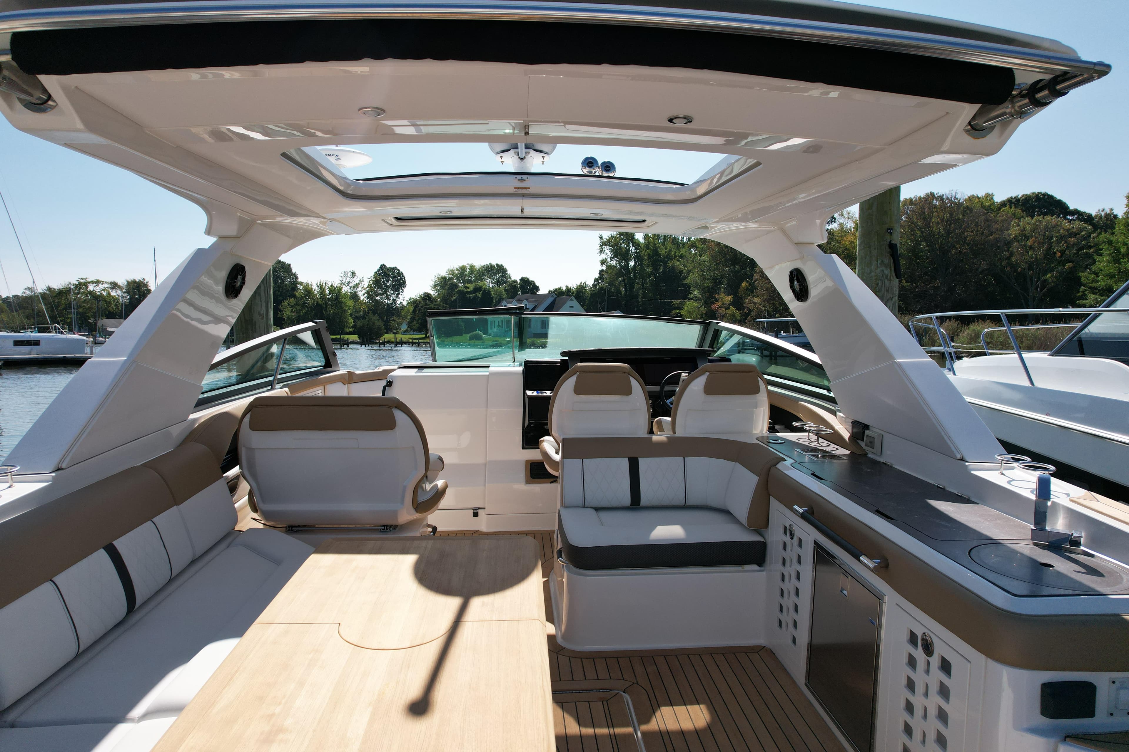 Luxurious 2019 Sea Ray SLX 400 boat interior with spacious seating and modern amenities.