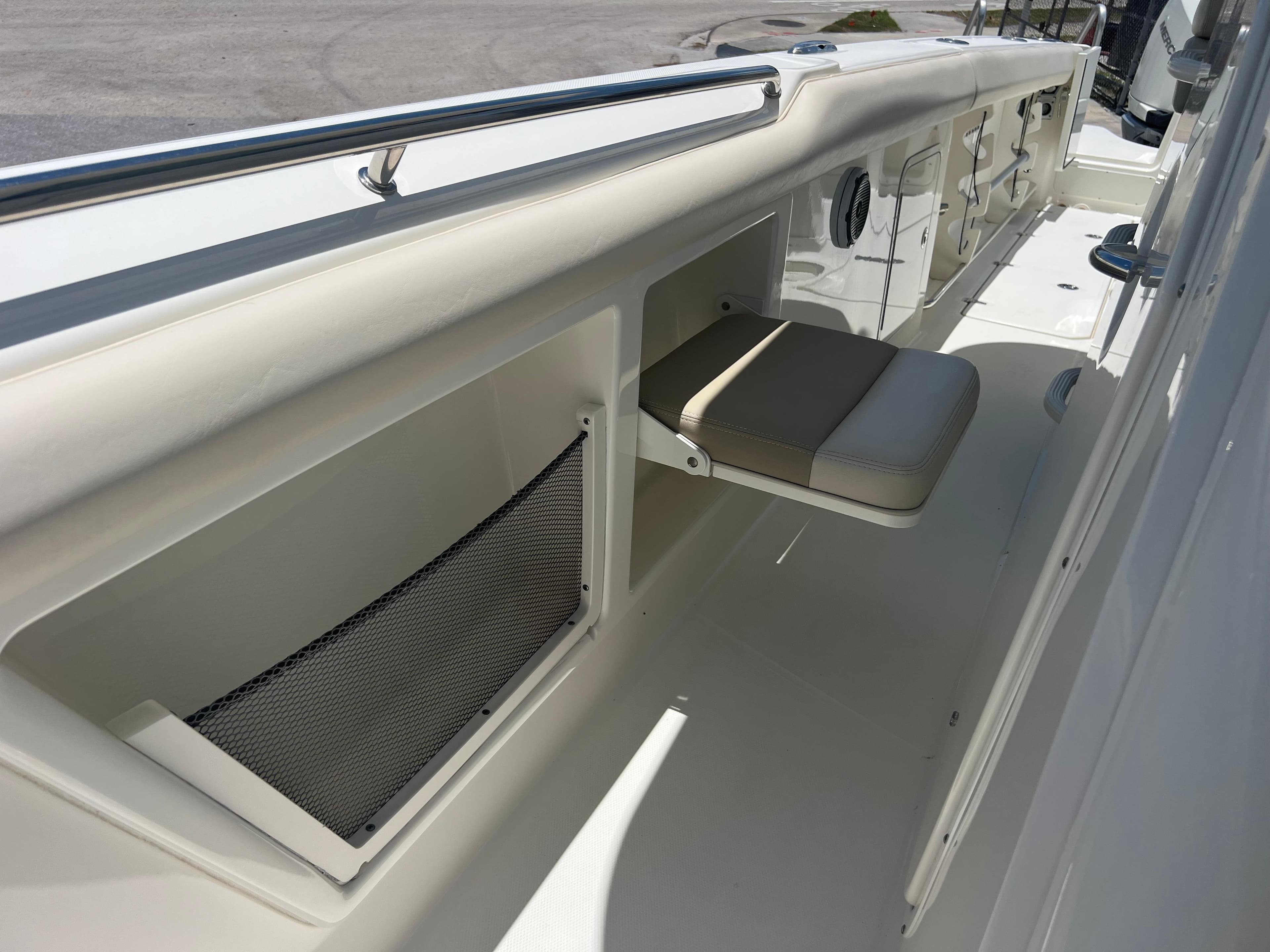 2017 Boston Whaler 350 Outrage interior with seating and storage compartments.