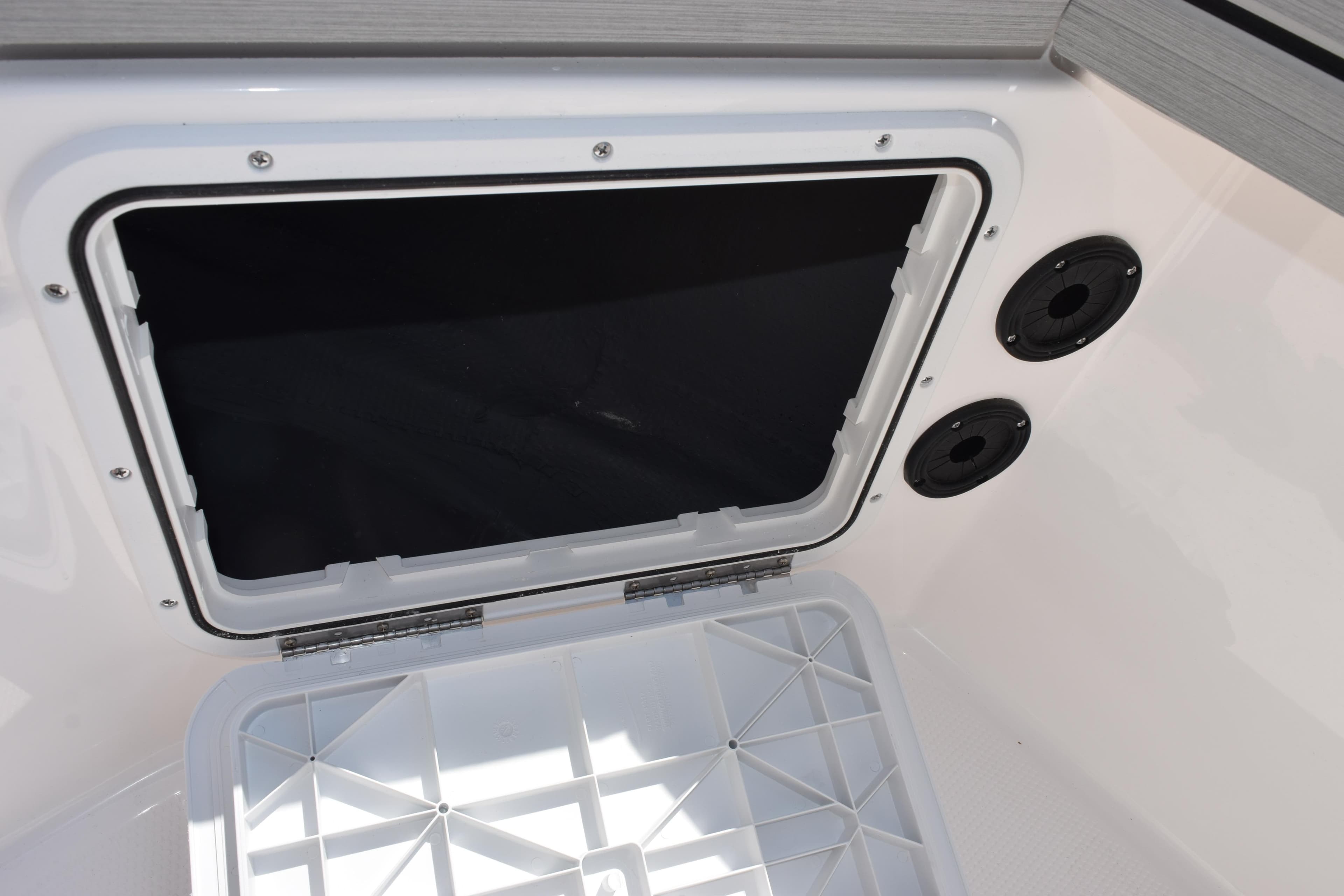 Open storage compartment on 2026 Yamaha Boats 190 FSH Sport.