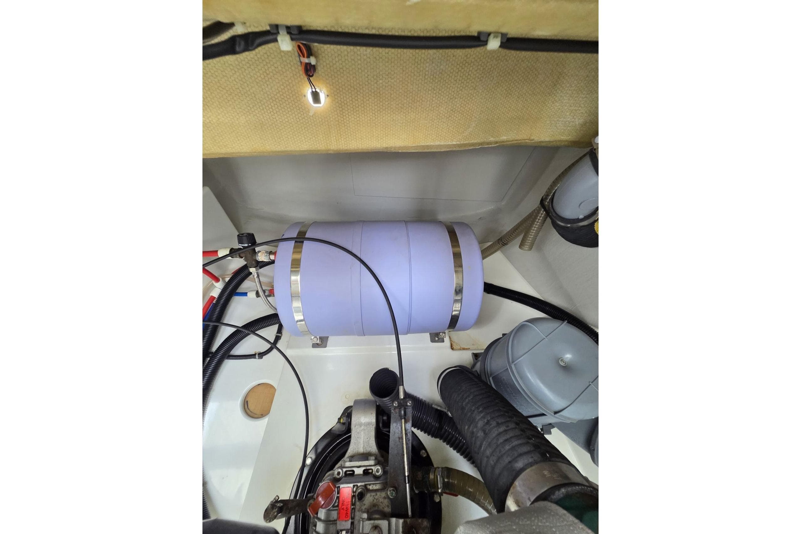 Engine compartment of 2022 Fountaine Pajot Elba 45 Catamaran with visible components and wiring.