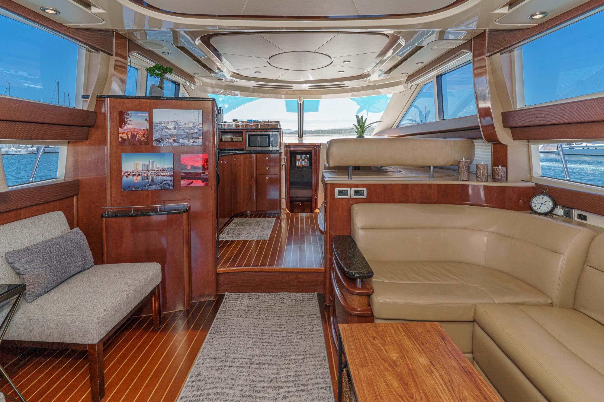 Luxurious interior of a 2009 Meridian 441 Sedan yacht with elegant wood finishes.