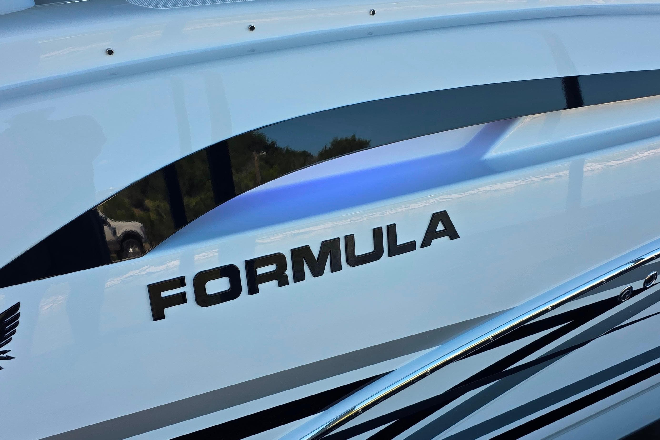 2026 Formula 350 Crossover Bowrider I/O boat with sleek design and branding.