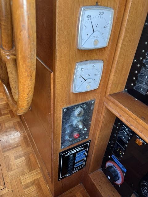 1981 Grand Banks 36 Classic helm with gauges and control panel.