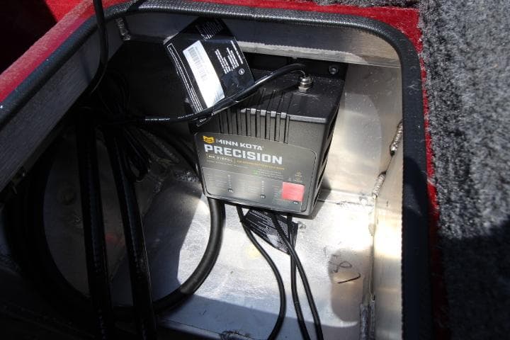 Battery compartment of 2025 Vexus ADX180LS with Minn Kota Precision charger.