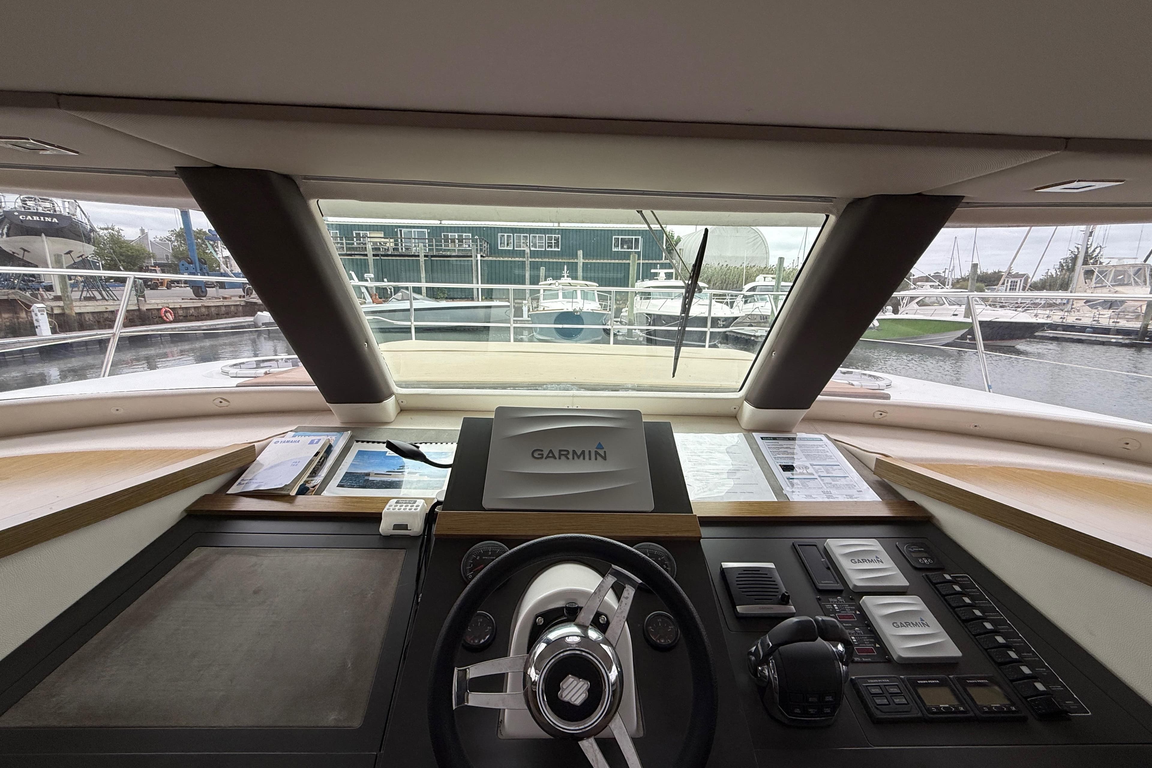 Cockpit view of 2015 Fountaine Pajot Summerland 40 LC with Garmin navigation system.