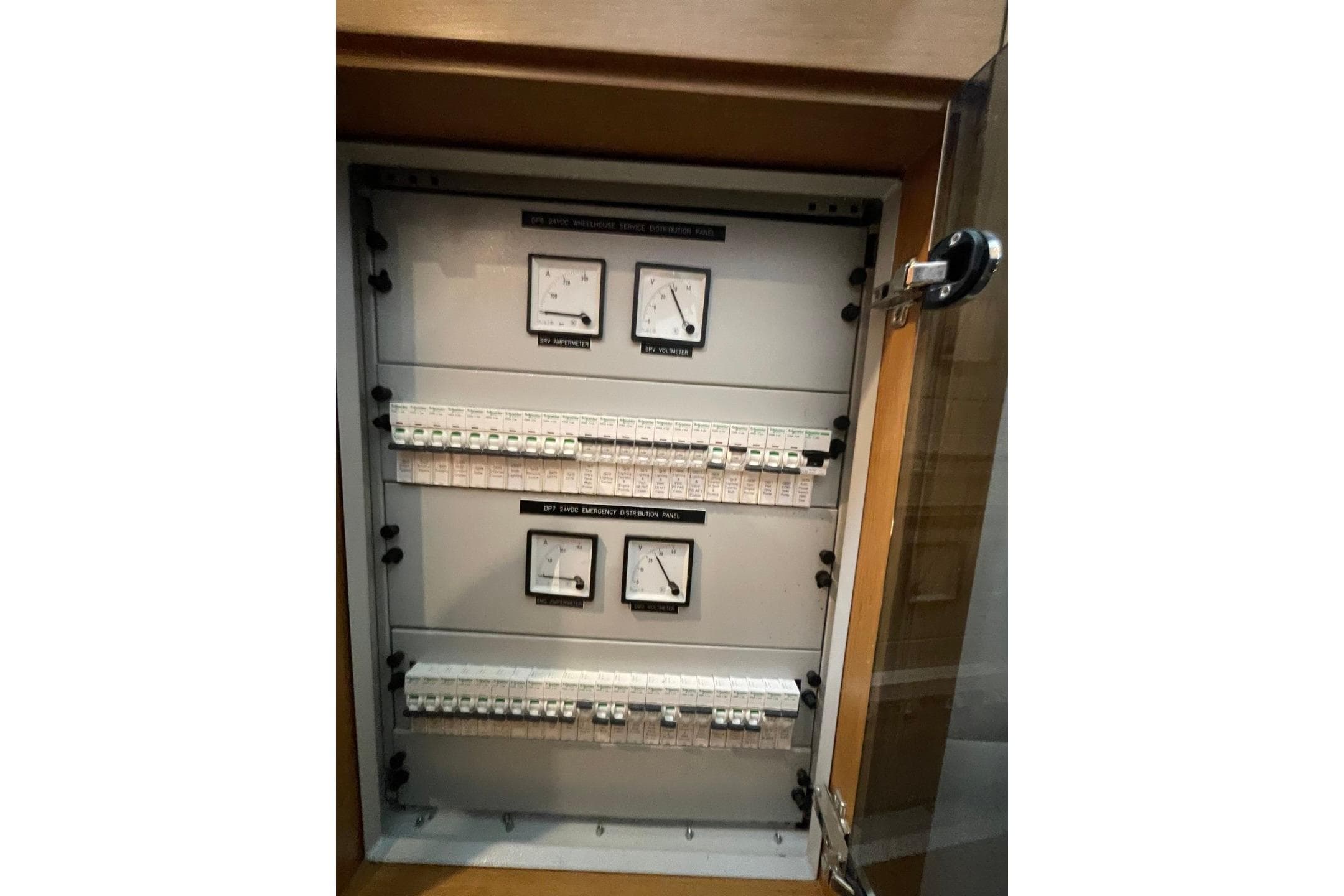 Electrical panel with gauges and switches in a Serenity 64, 2018 model.