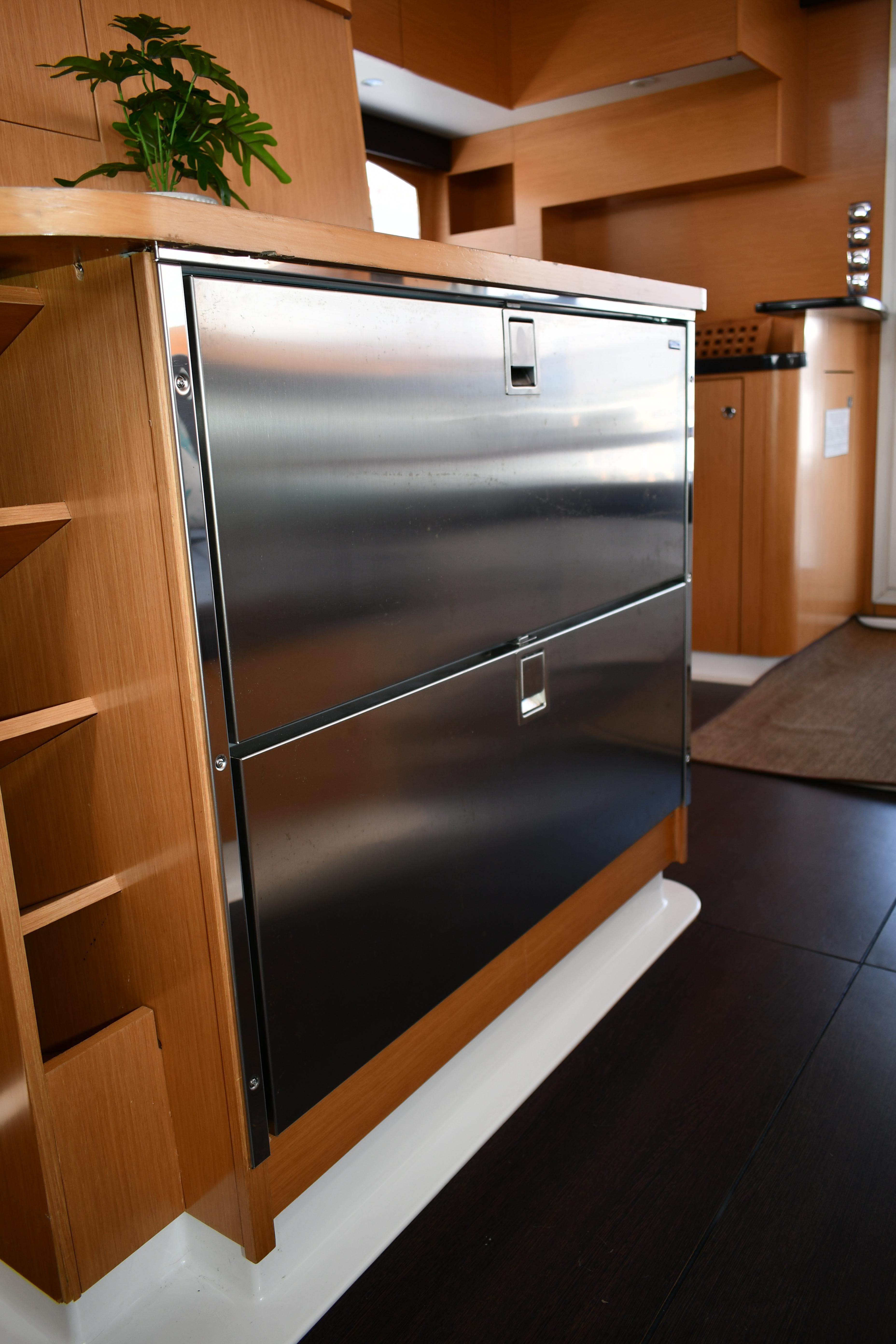 Modern kitchen interior of 2012 Fountaine Pajot 40 catamaran with stainless steel appliances.