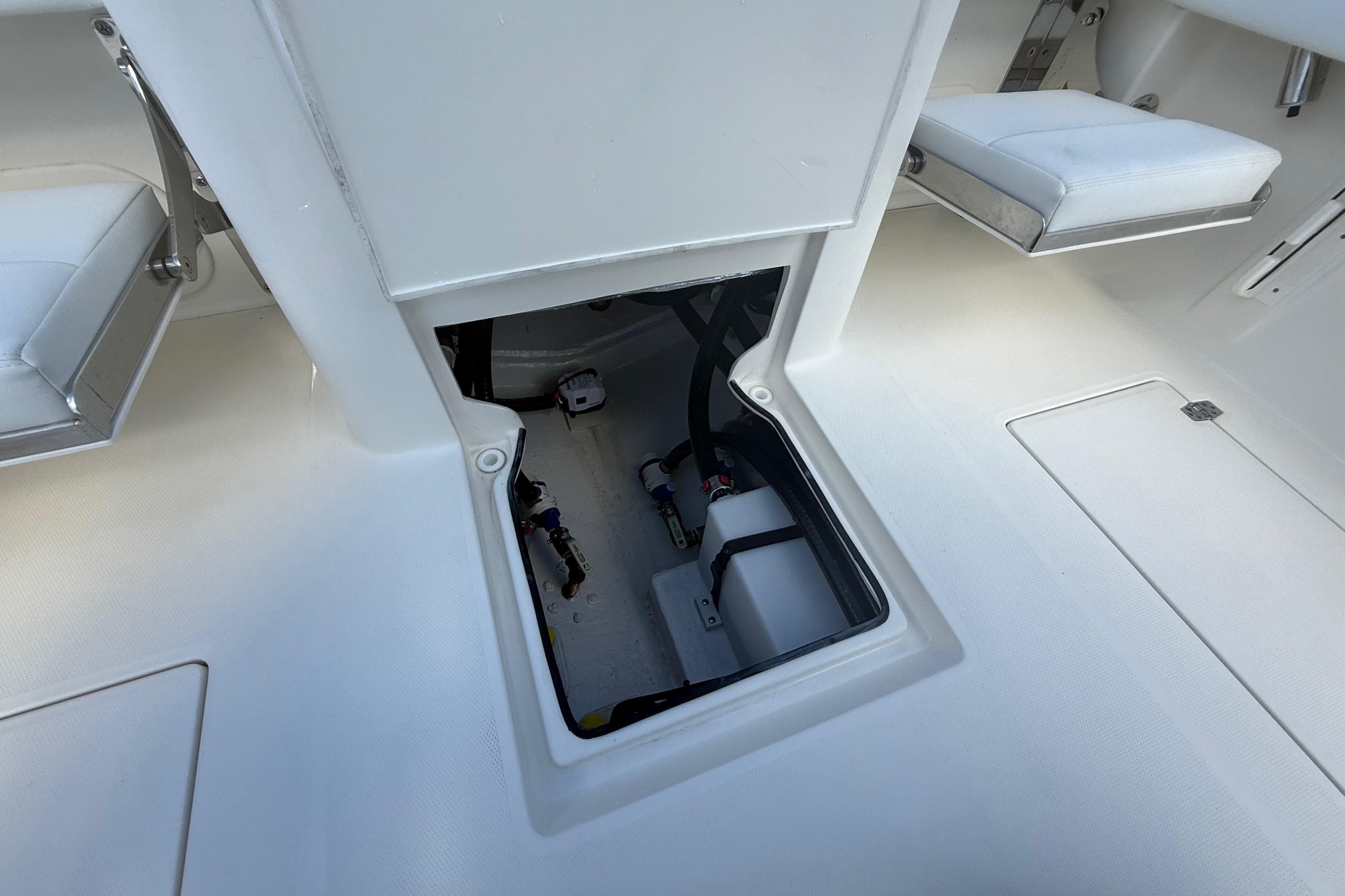 2026 Pathfinder 2400 Open boat interior with open storage compartment.