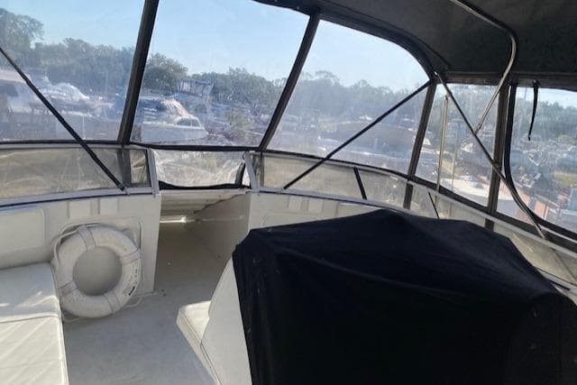 1998 Carver 380 Santego boat interior with seating and life preserver.