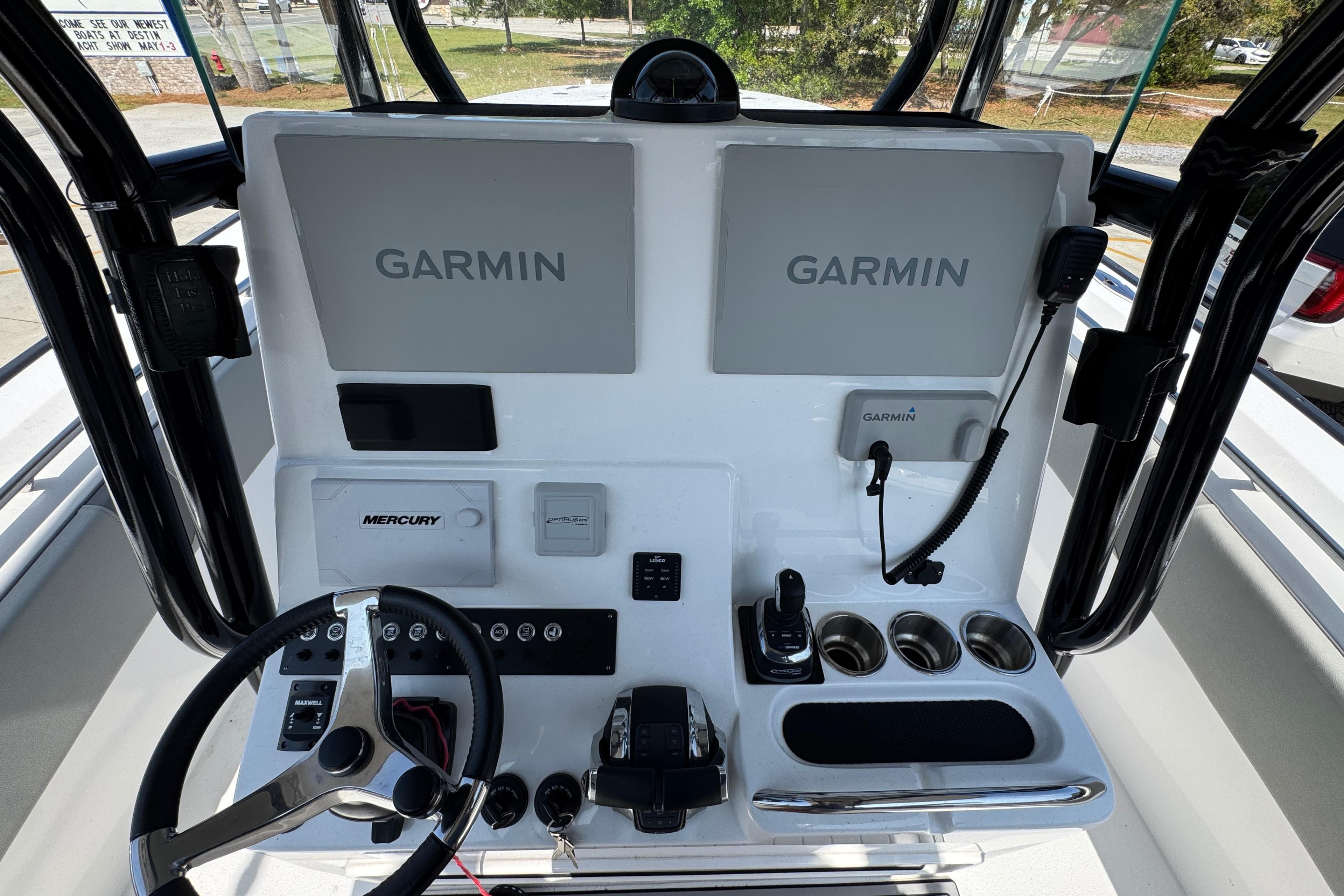 Cockpit of 2025 Cape Horn 32 XS boat with Garmin navigation displays.