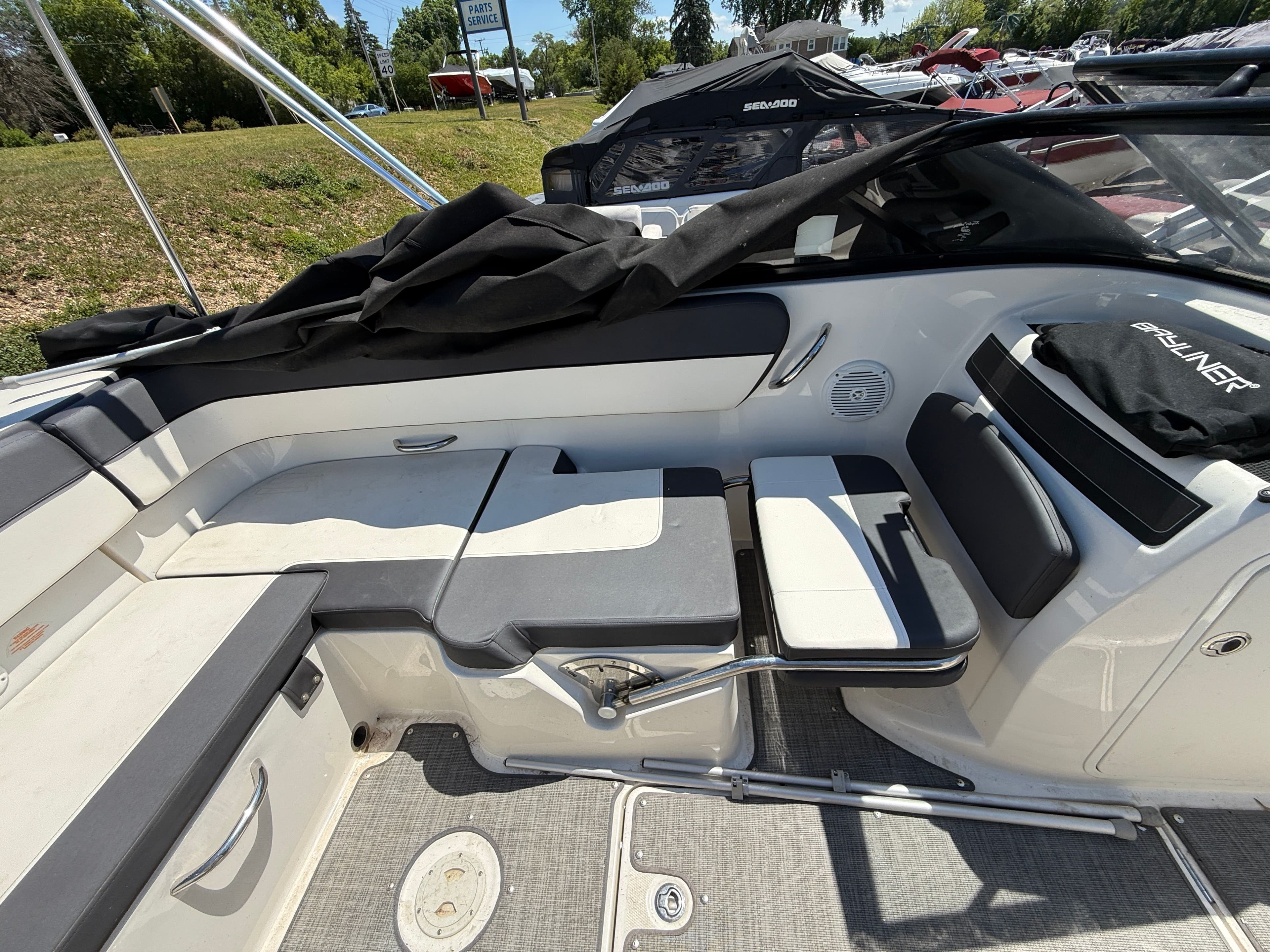 Interior of a 2019 Bayliner VR5 boat with seating area.