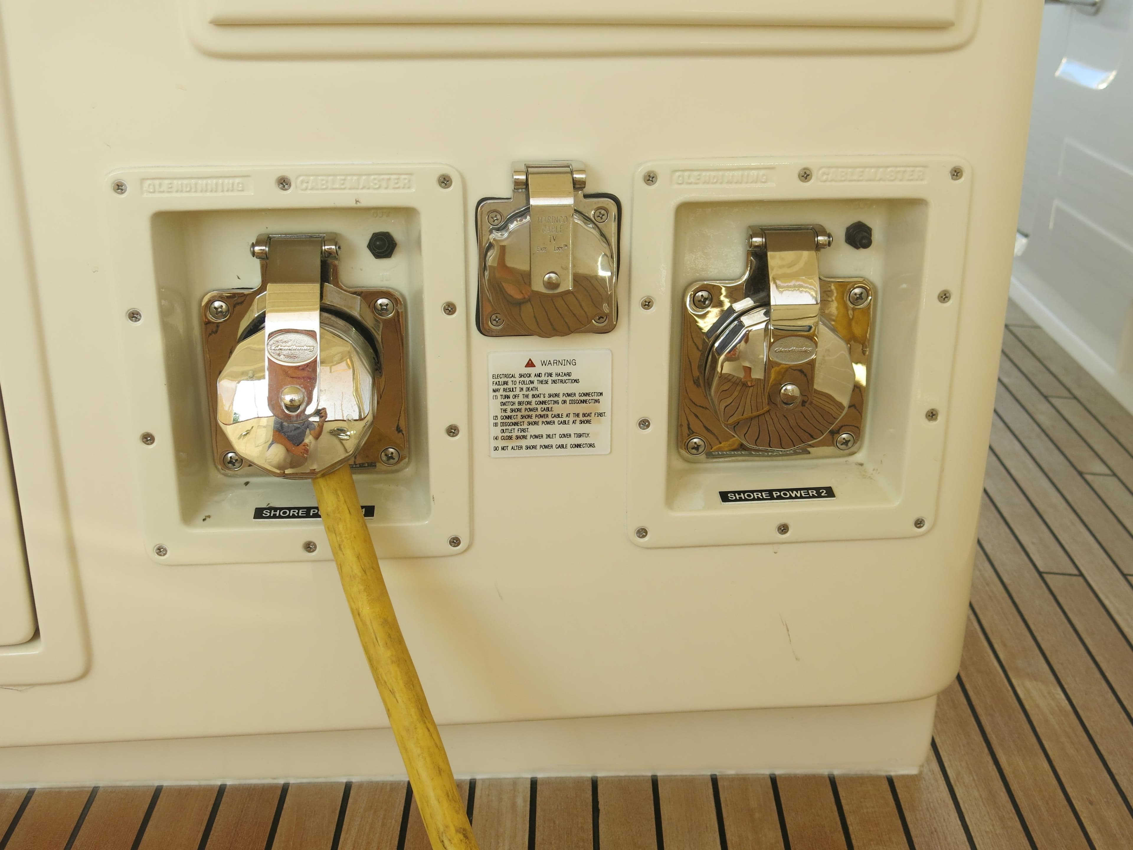 Kadey-Krogen 58EB 2017 yacht power connections on teak deck.
