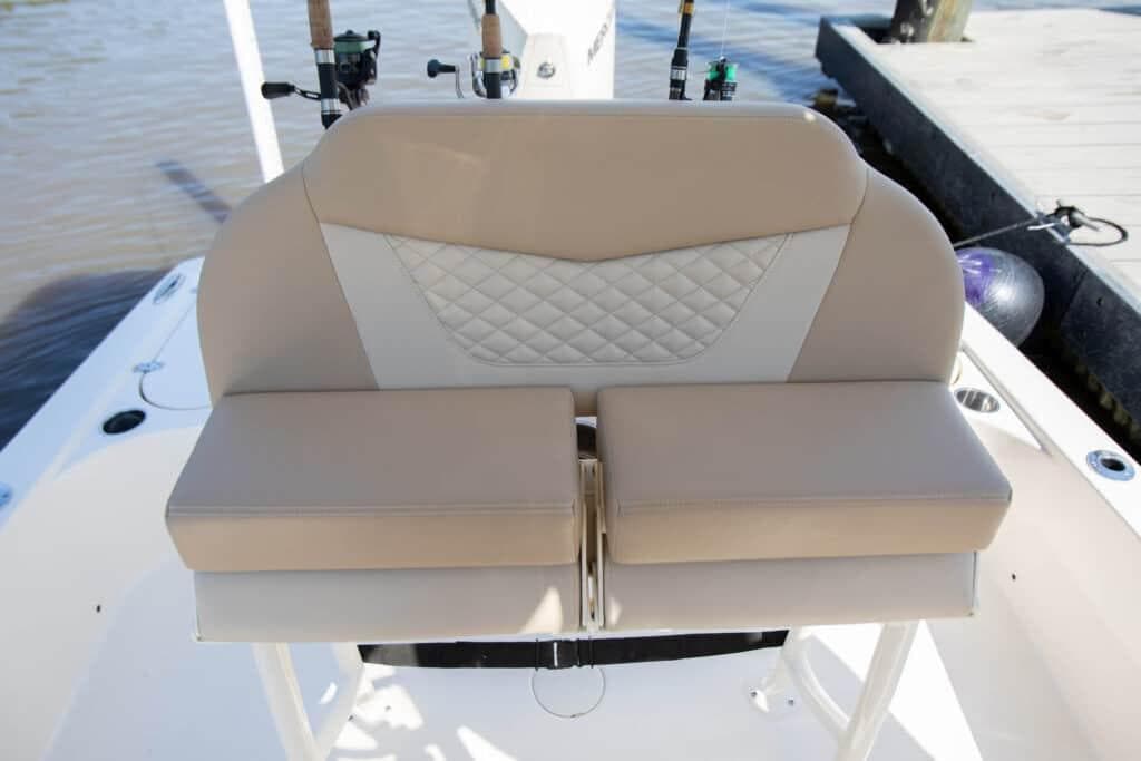 Manufacturer Provided Image: 2025 Scout 231 XSB boat seating with beige cushions and quilted design.
