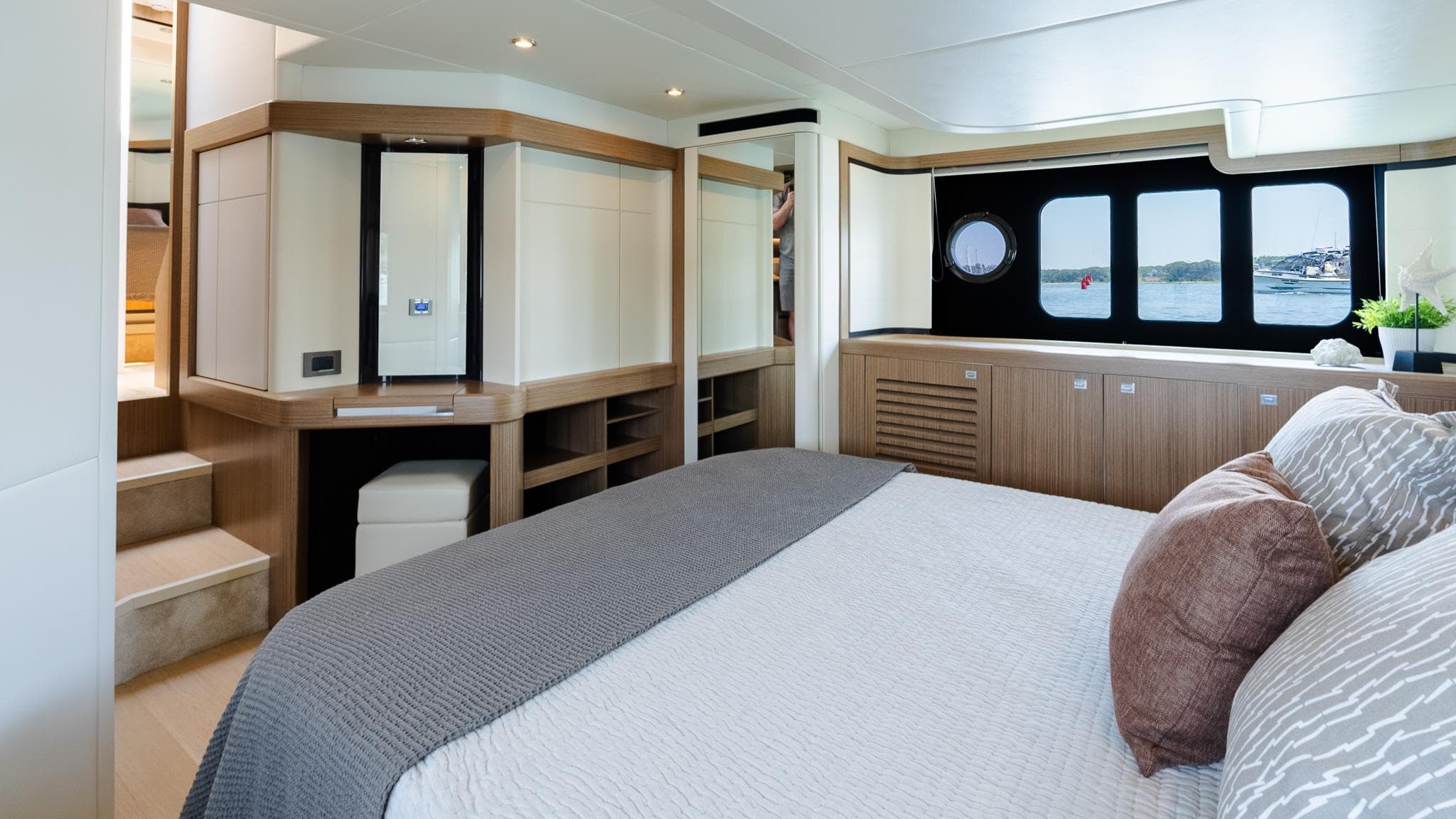 Luxurious interior of 2017 Absolute 50 Fly yacht with modern bedroom design.