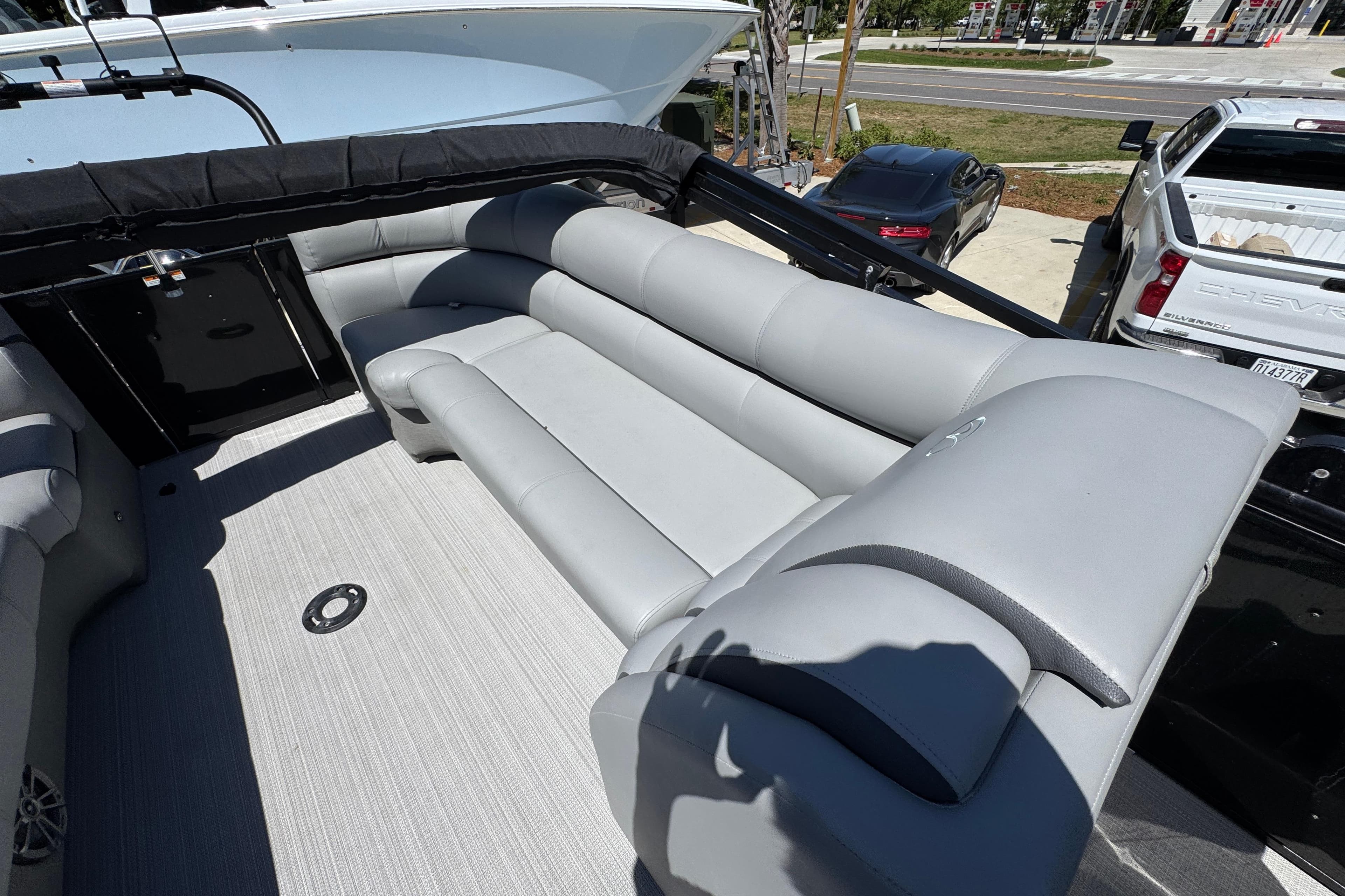 2023 Veranda VTX 25RC boat interior with luxurious gray seating and spacious layout.