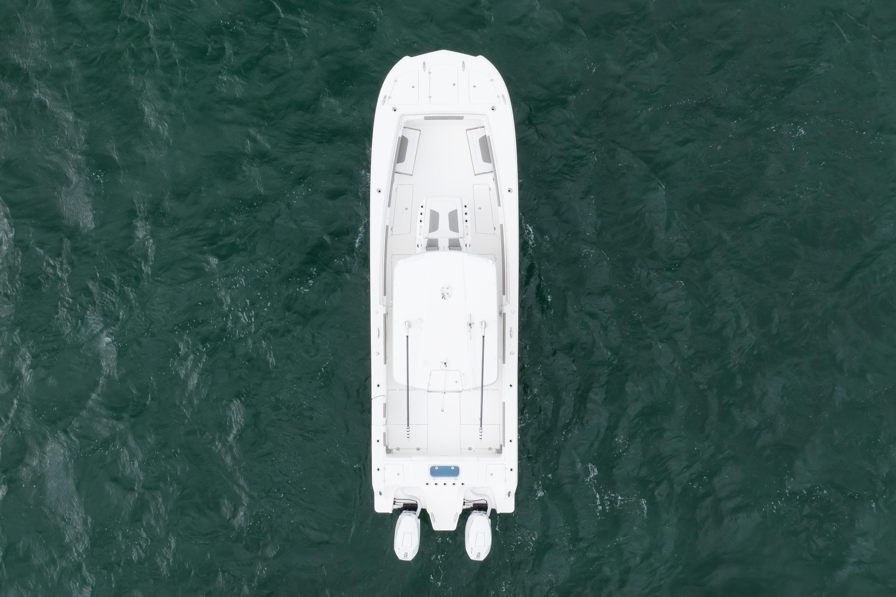 Aerial view of 2024 Caymas 341 CC boat on open water.