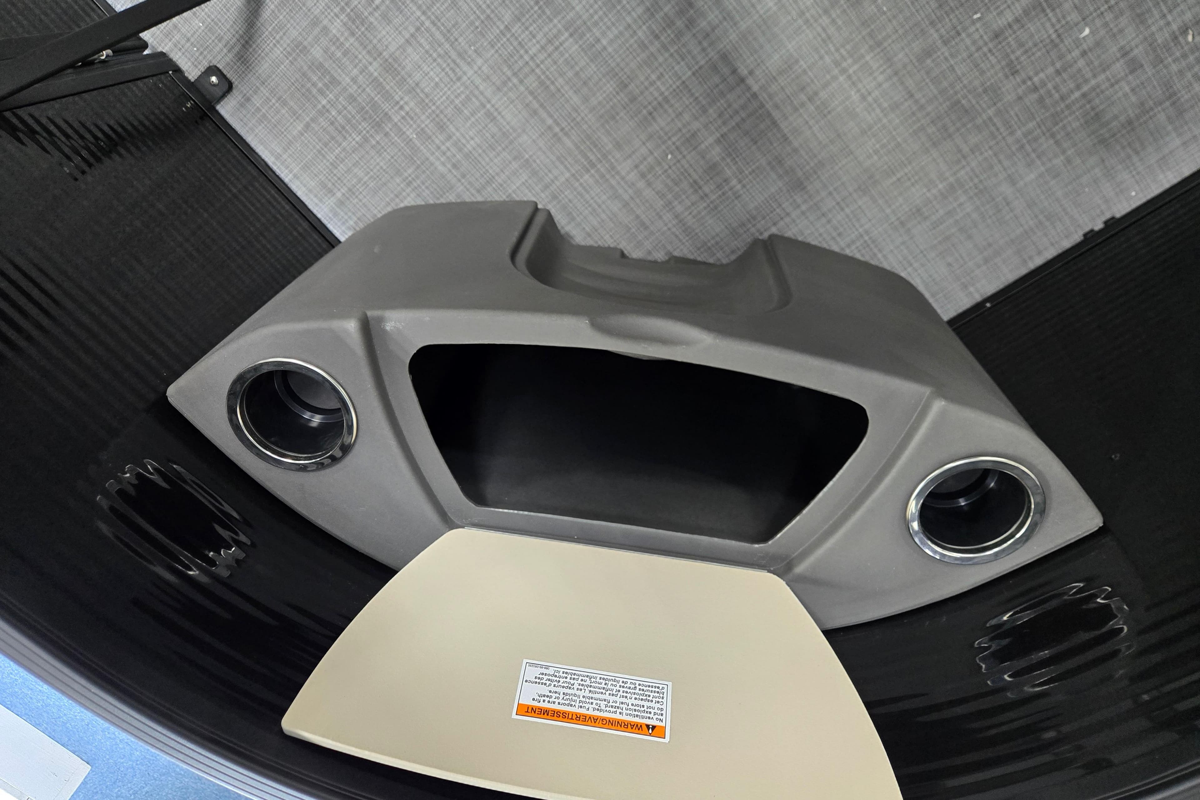 Interior view of 2026 Princecraft Brio 17 Electric boat dashboard with speaker system.