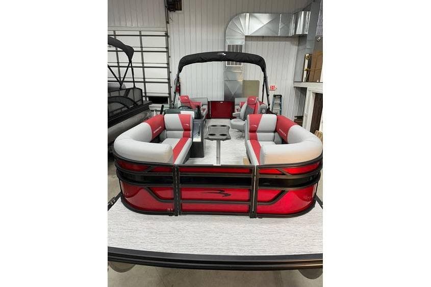 2026 Bennington 22 SSR Quad Bench pontoon boat with red and gray seating, in stock.