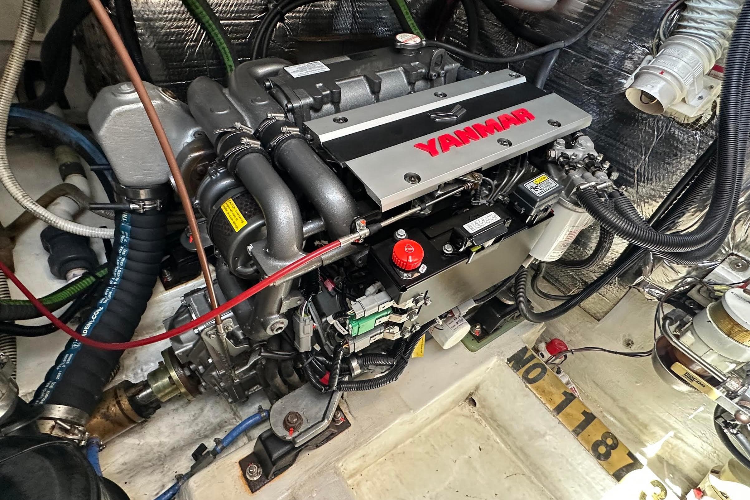 Engine compartment of a 1995 Sundeer 56 yacht featuring a Yanmar engine.
