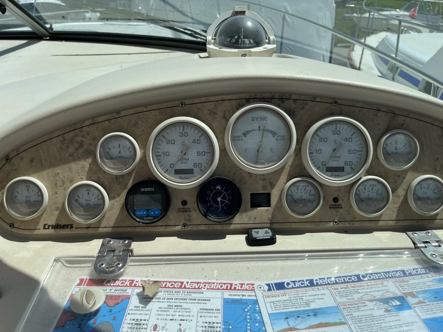 1998 Cruisers Yachts 3870 Esprit dashboard with gauges and navigation charts.