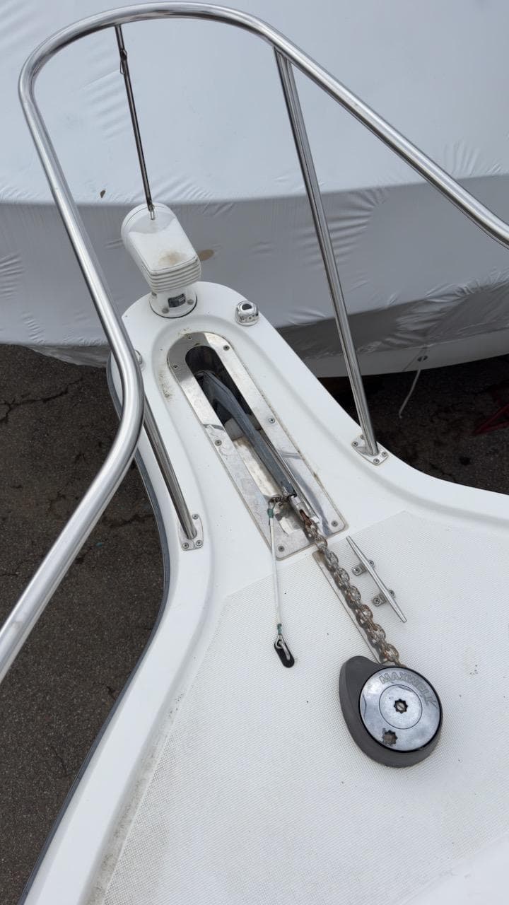 2005 Tiara Yachts 2900 Open bow with anchor chain and railing.