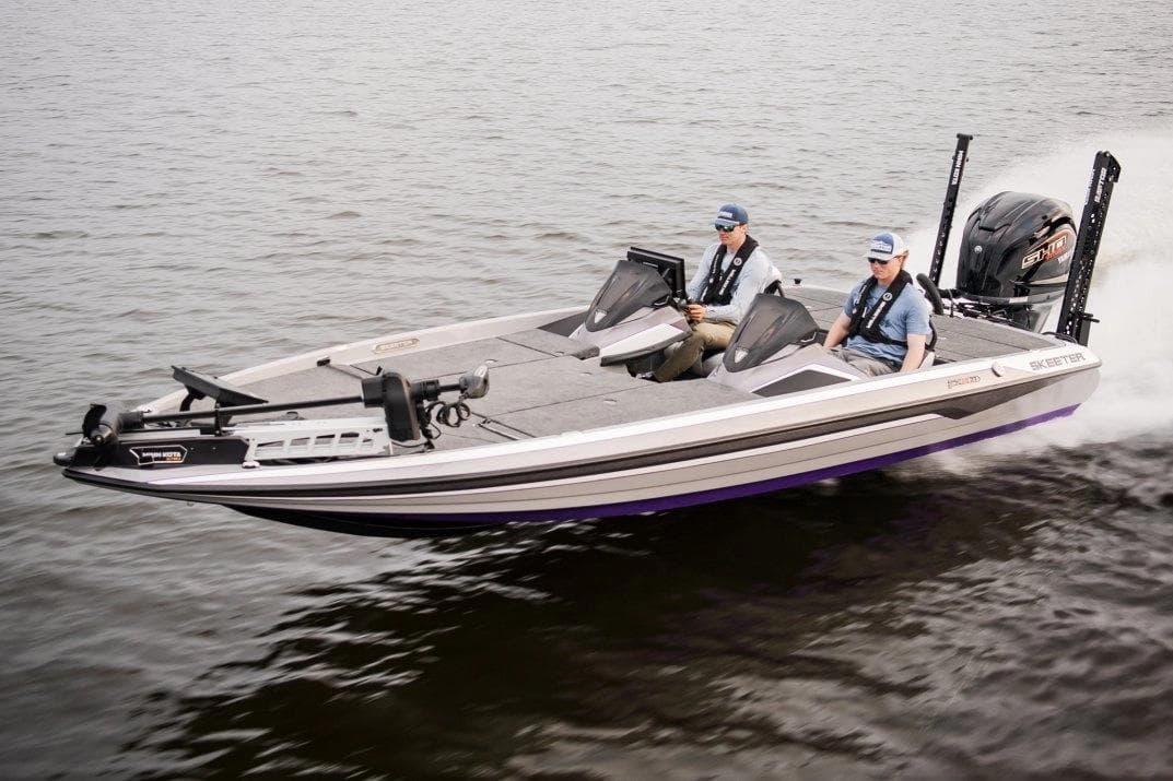 Manufacturer Provided Image: 2026 Skeeter FXR21 FLEX boat cruising on water with two passengers.