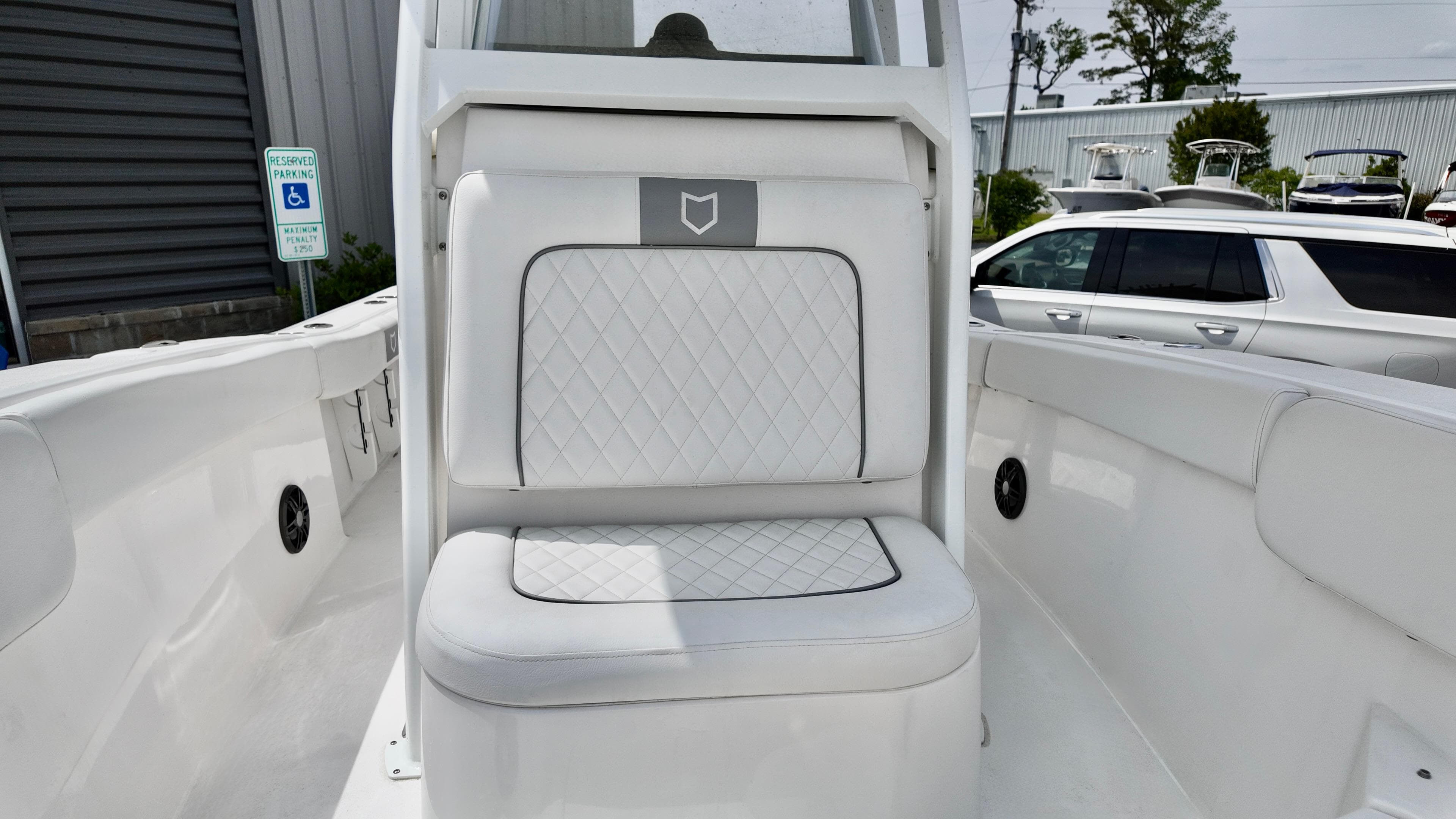2025 Sea Fox 228 Commander boat interior with cushioned seating and sleek design.