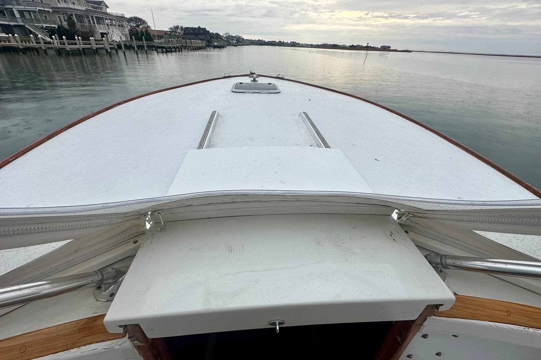 1987 Palm Beach 30 Express boat deck view on calm water.