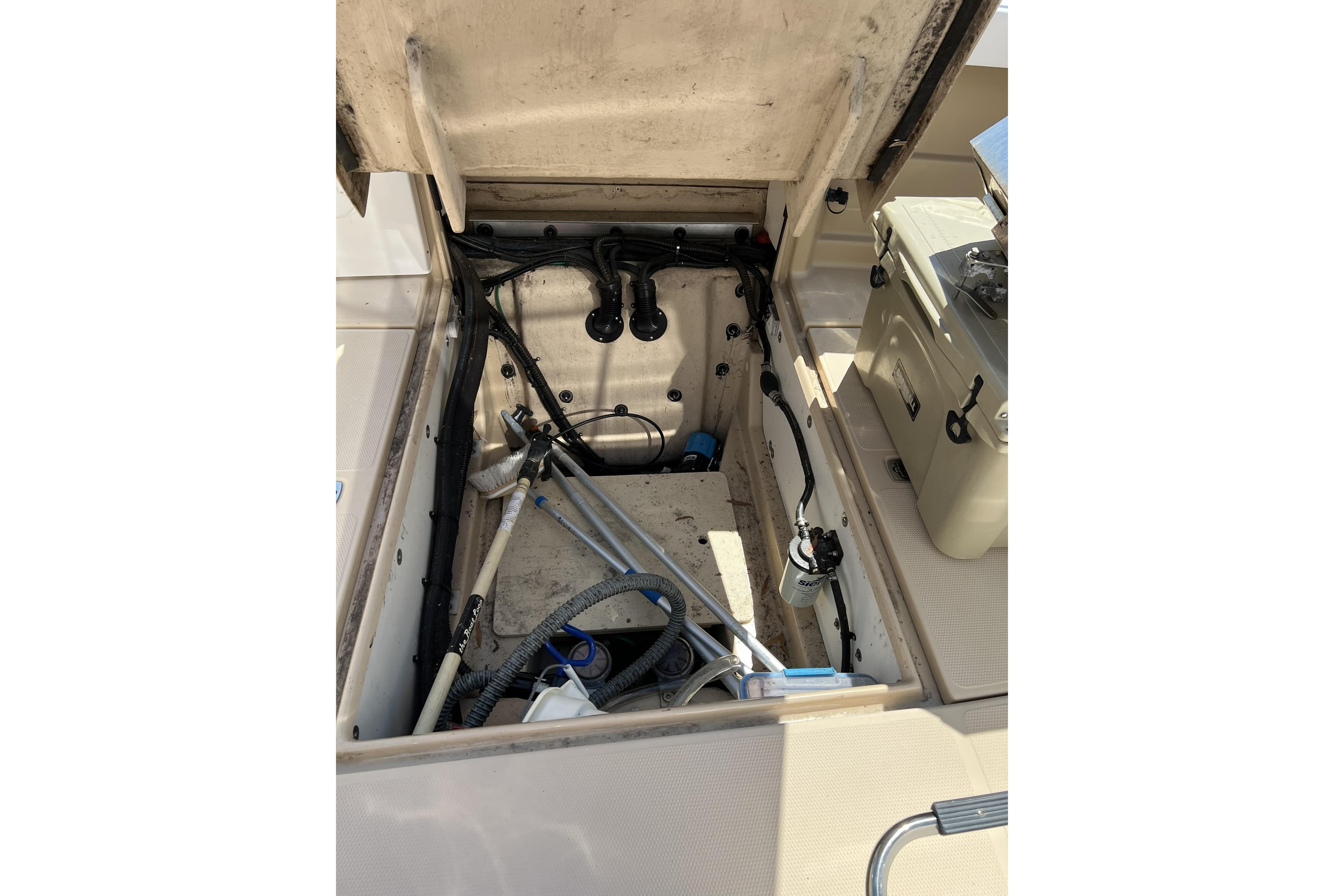 Open engine compartment of 2018 Ranger Tugs R-23 boat, showing internal components and wiring.