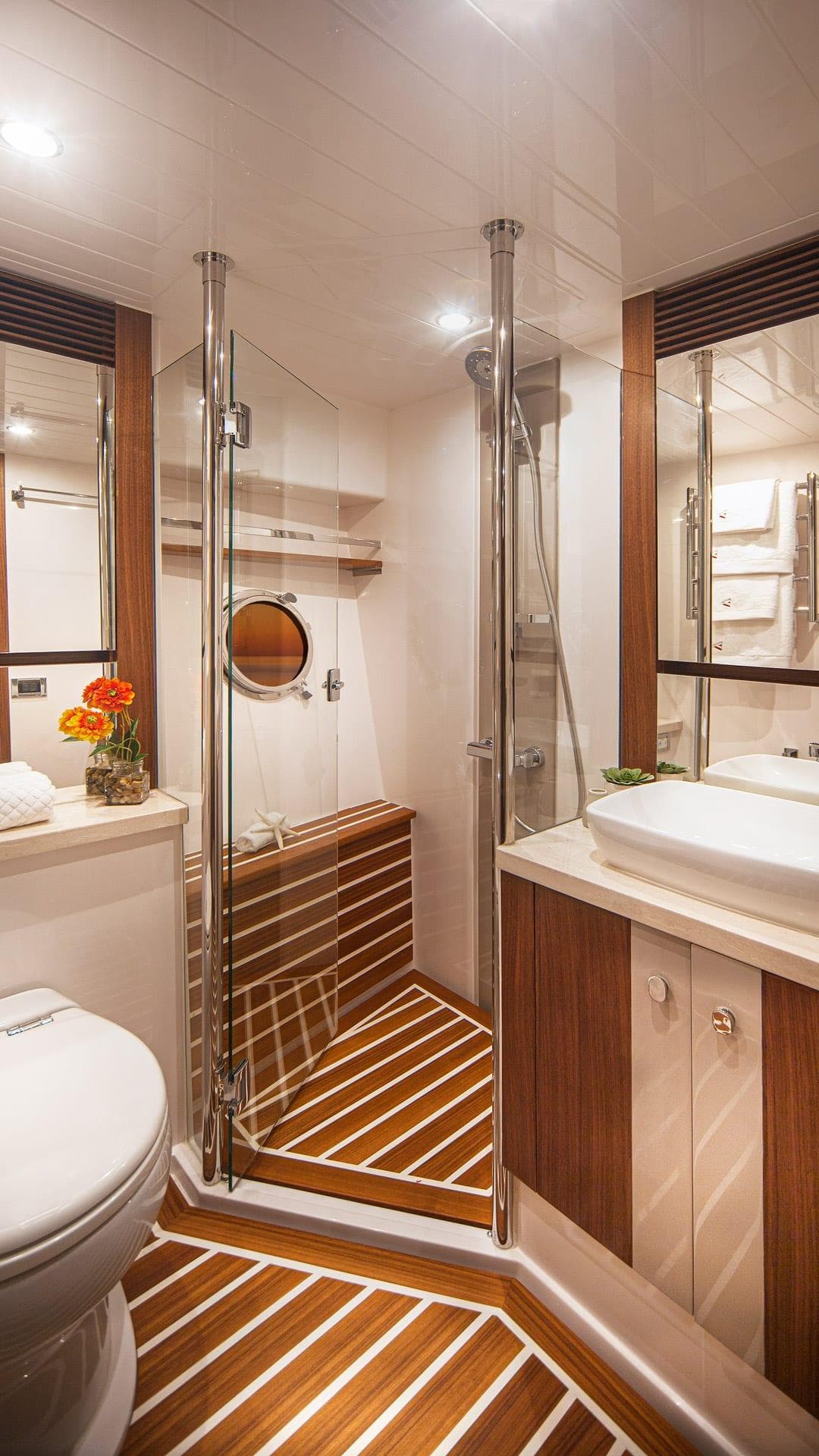 Luxurious bathroom in 2024 Belize 66 Daybridge yacht with modern fixtures and wooden accents.