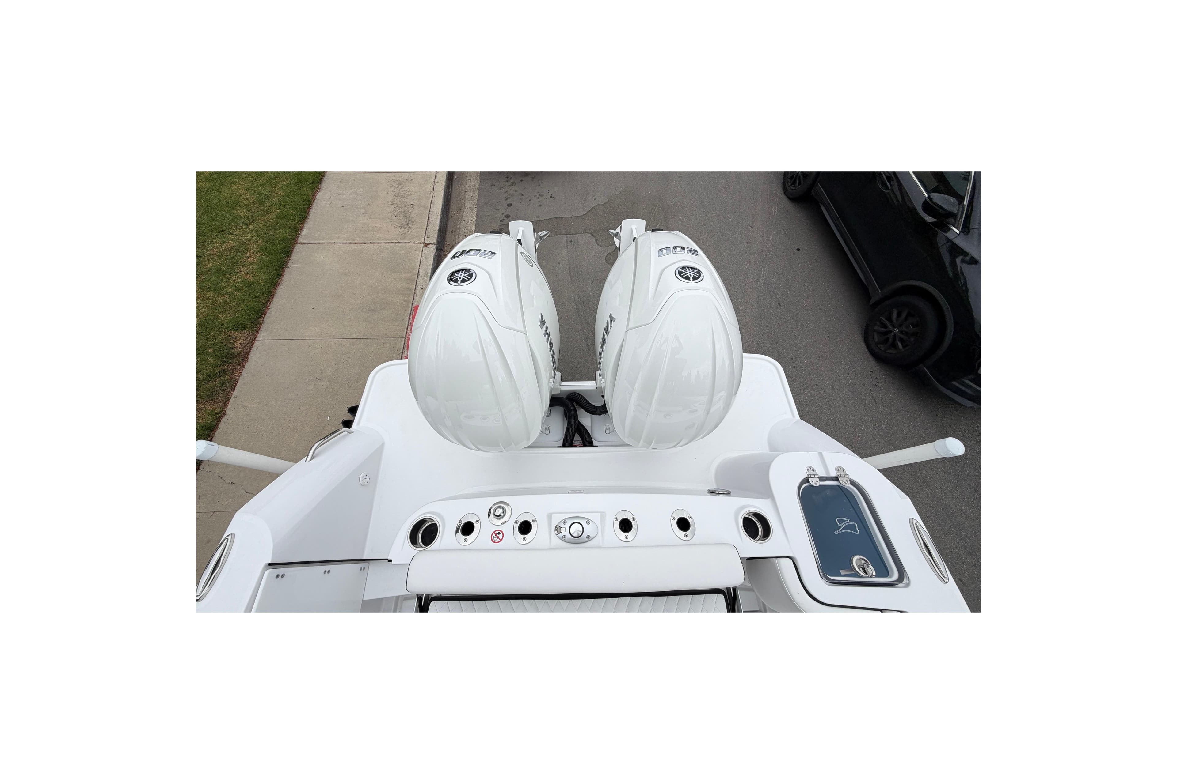 2026 Stingray 253 CC boat with dual outboard motors, viewed from above.