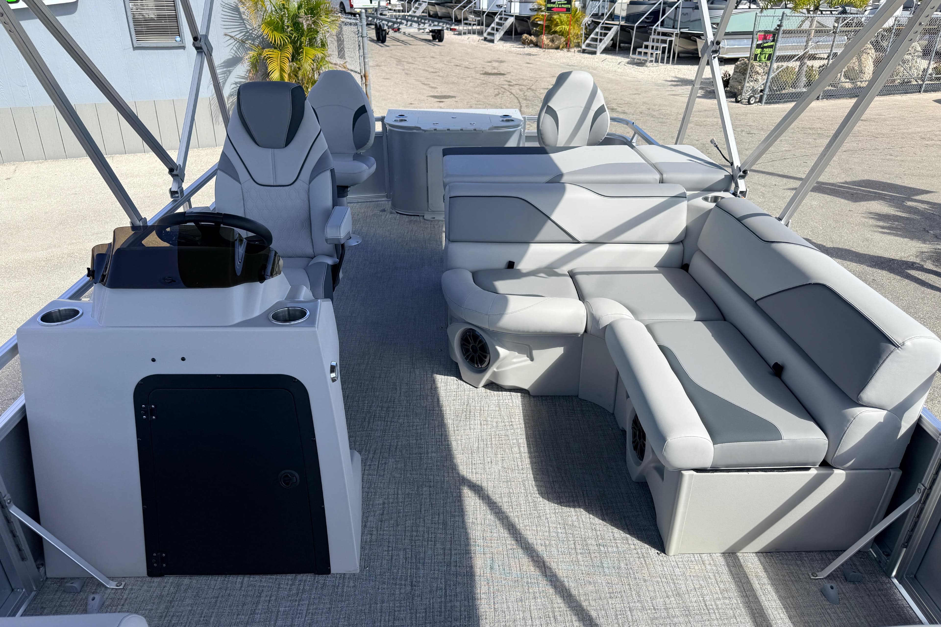 2026 Avalon 2385 Venture 85 Tri Toon boat interior with plush seating and modern helm.