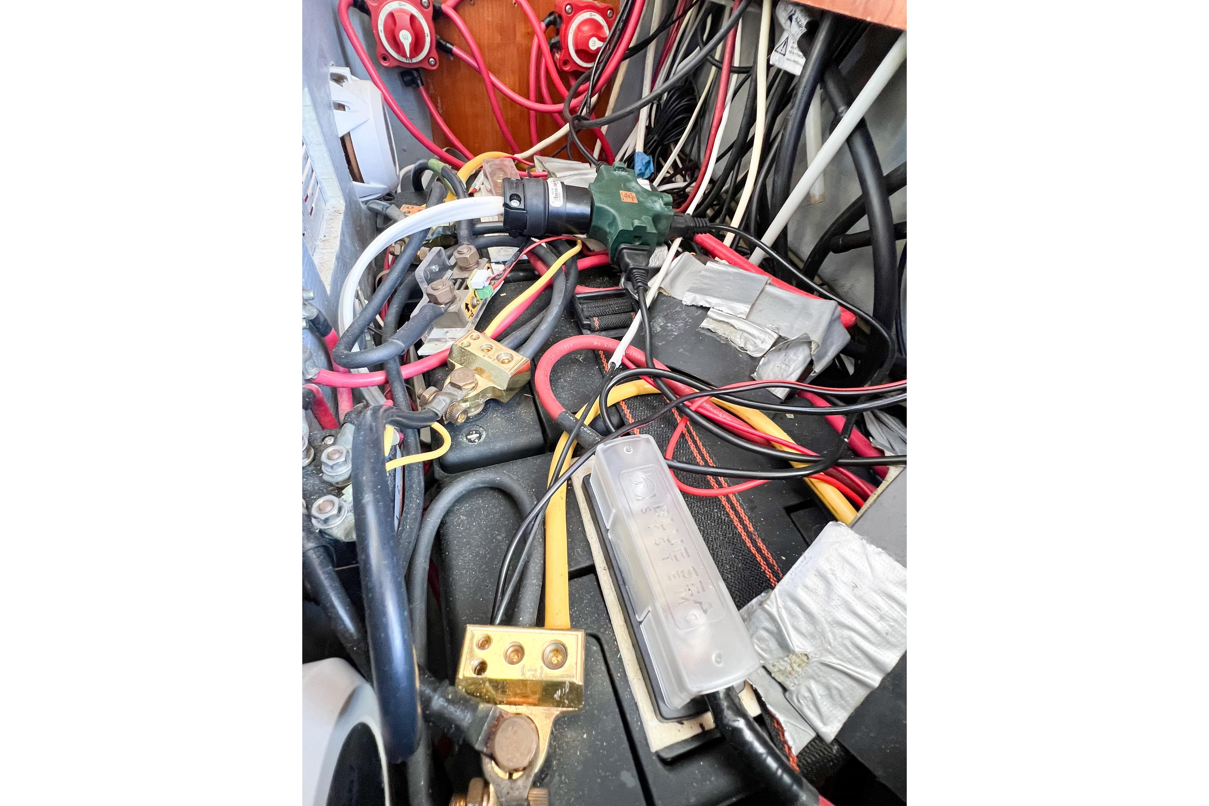 Electrical wiring and components inside a 2012 TomCat 9.70 s boat.