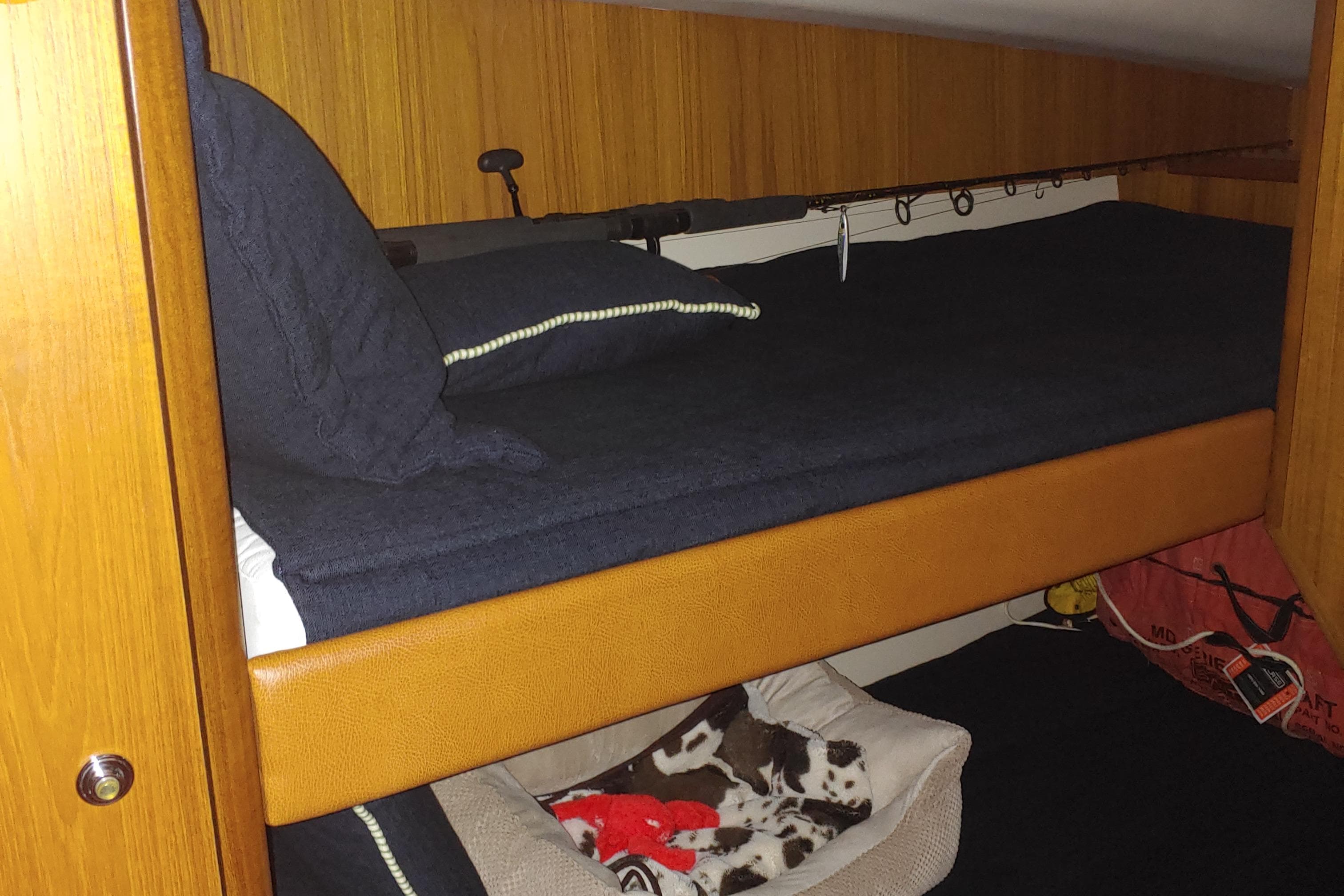 Interior of 2013 Tiara Yachts 39 Convertible with bunk bed.