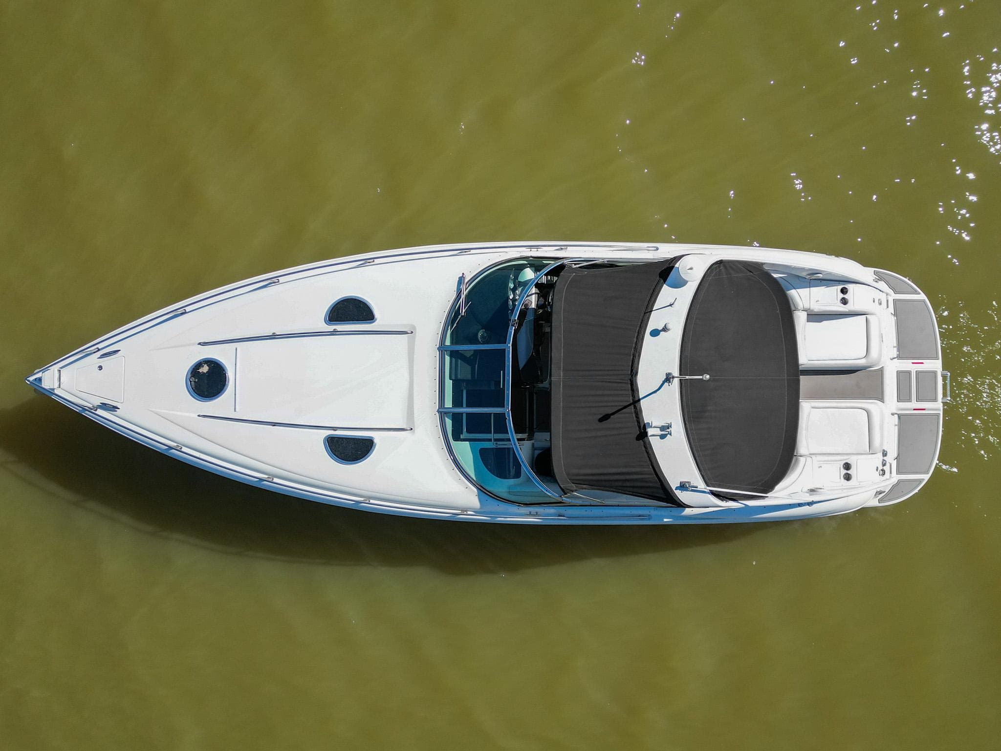Overhead view of a 2004 Cobalt 360 boat on water.