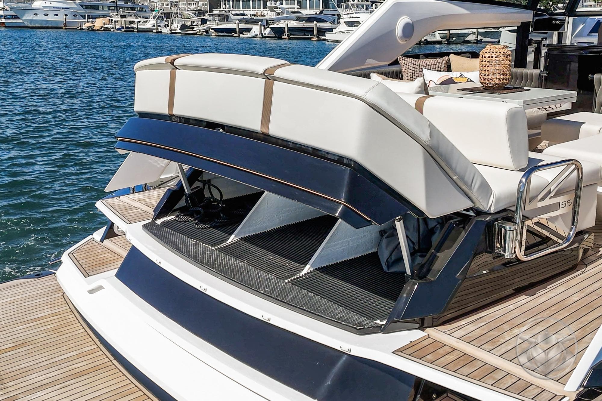 Luxurious 2026 Sunseeker Superhawk 55 yacht with elegant deck and seating area.