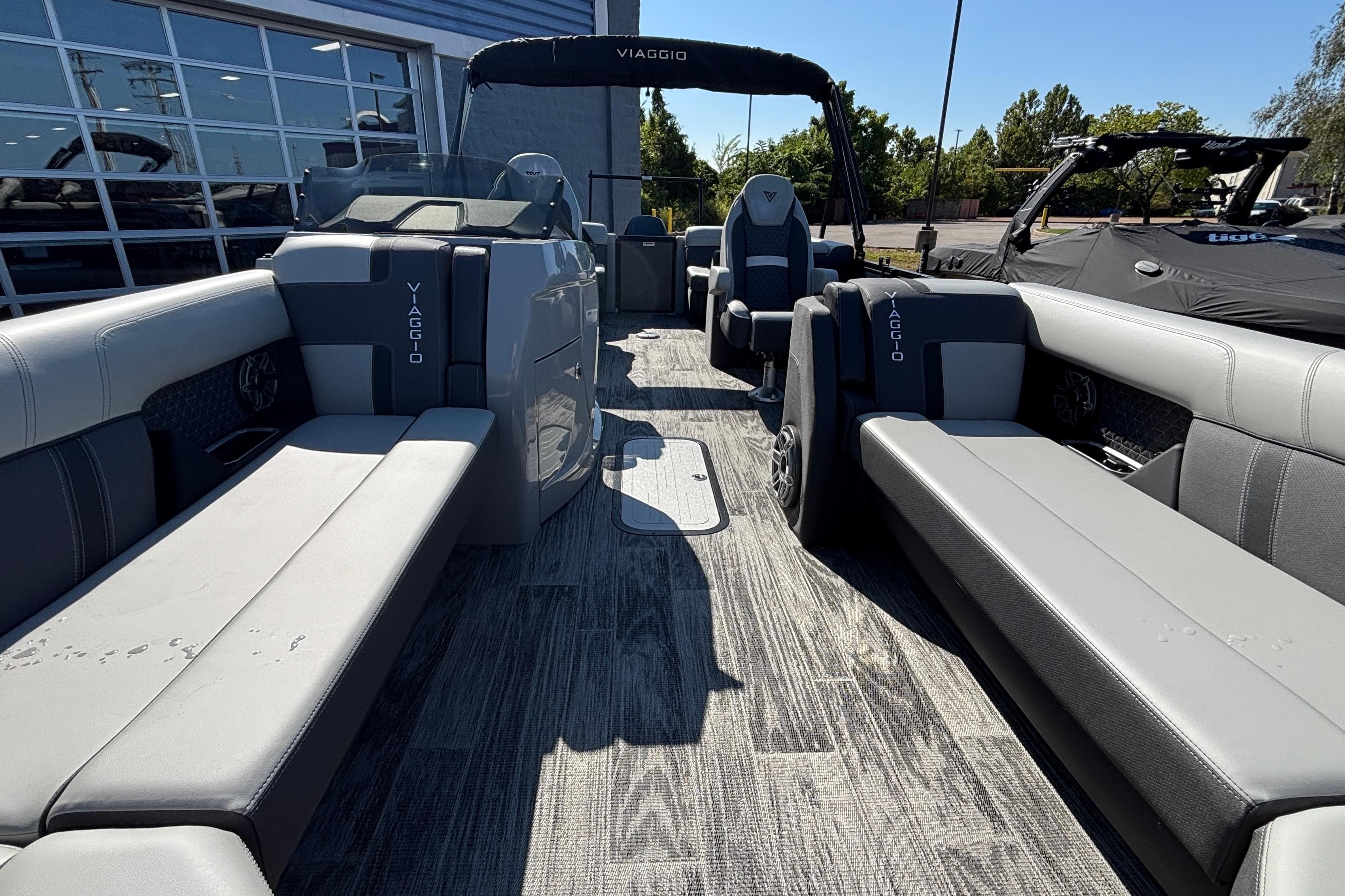 2026 Viaggio Z24U pontoon boat interior with gray seating and modern design.
