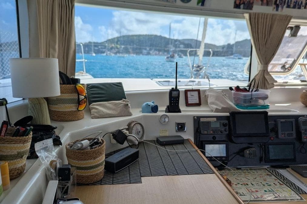 Interior view of a 2008 Lagoon 420 yacht with navigation equipment and ocean view.
