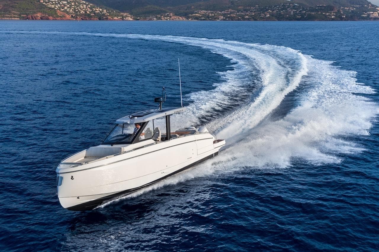 2026 Beneteau Gran Turismo 35 yacht cruising on open sea, creating a dynamic water trail.