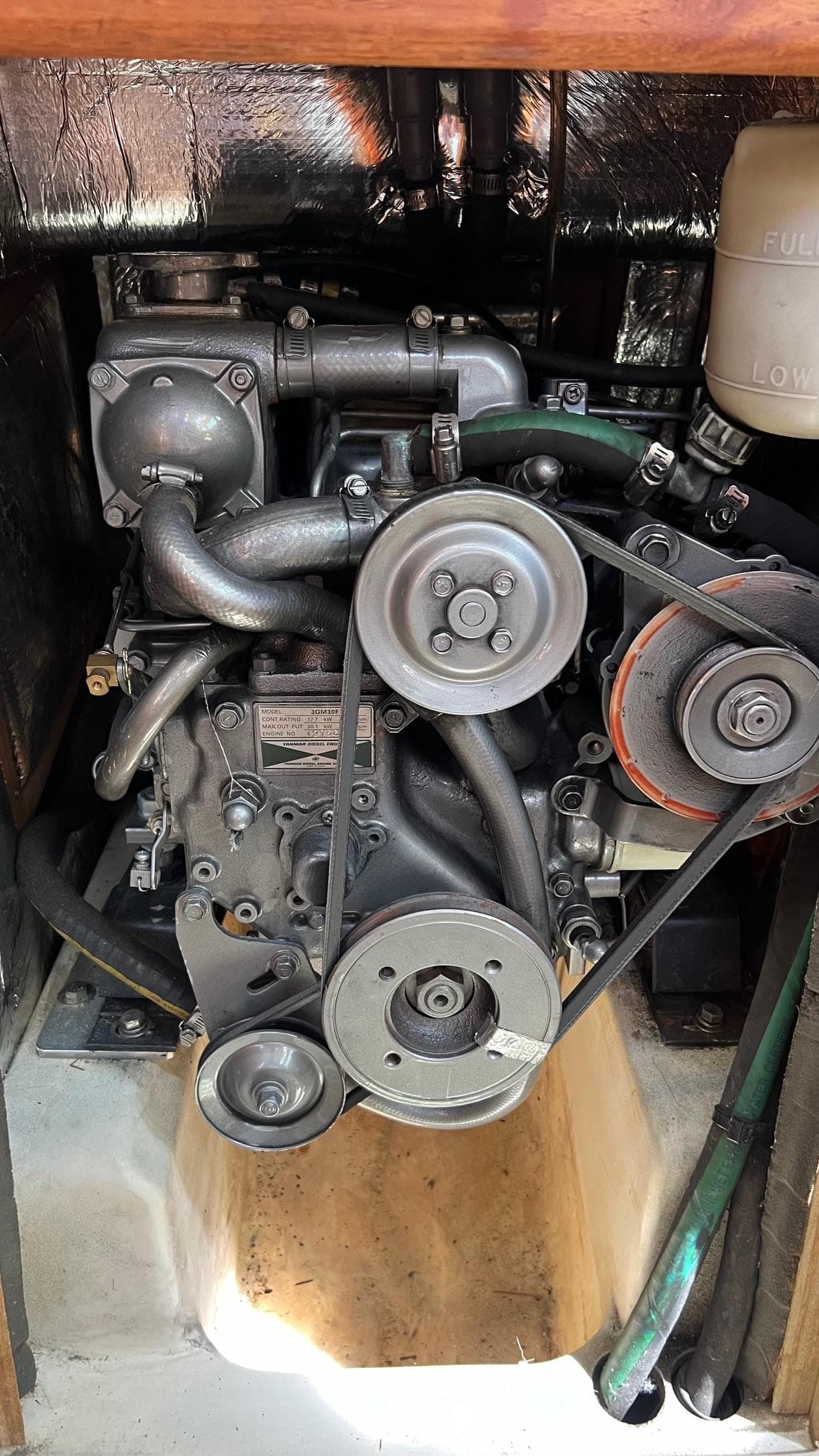 Engine compartment of a 2001 Hunter 340 sailboat.
