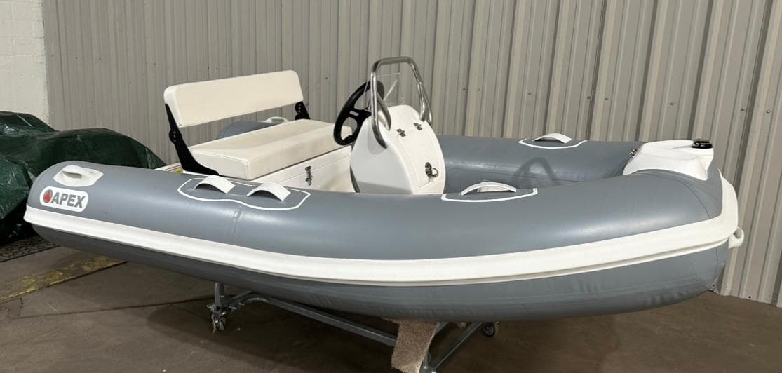 2024 Apex A-10 Eurosport Rib Gallery inflatable boat in a warehouse setting.