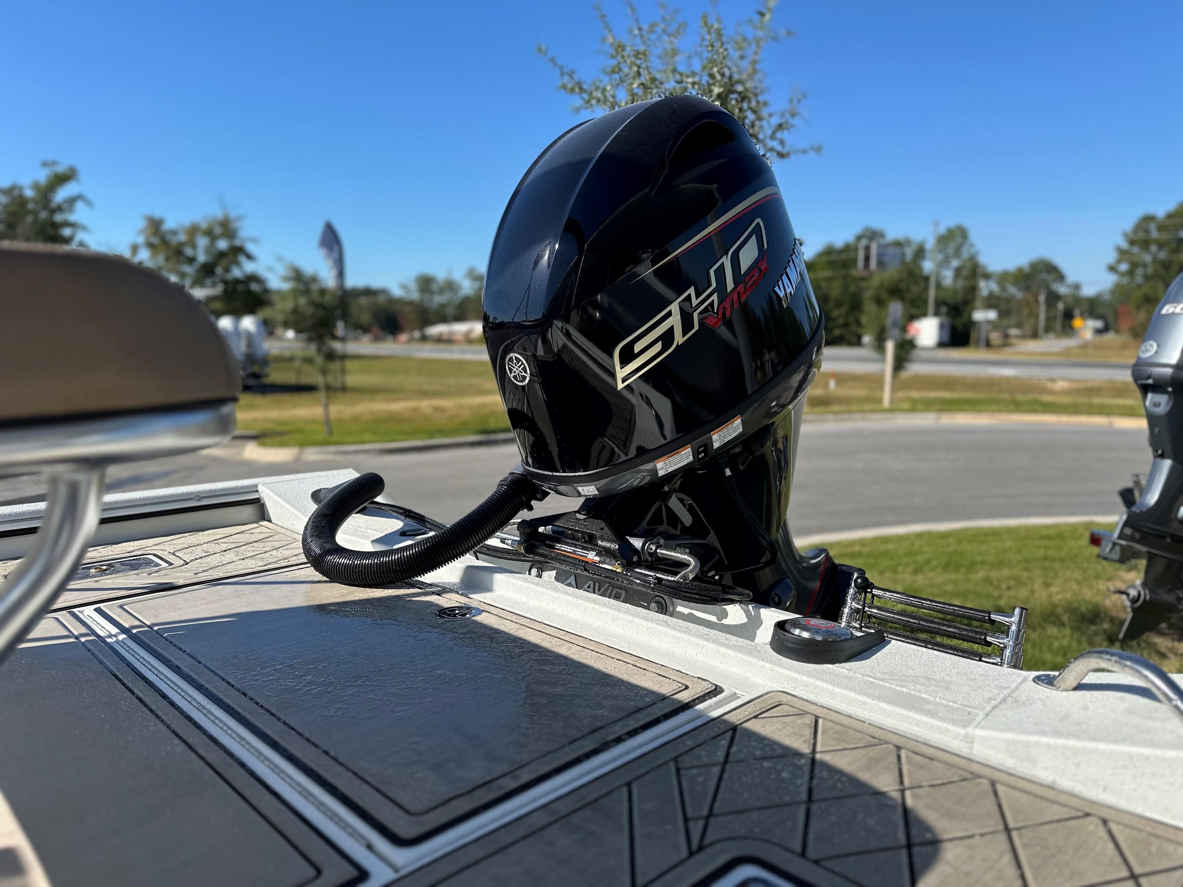 Avid 18 Rogue 2025 boat with Yamaha outboard motor on a sunny day.