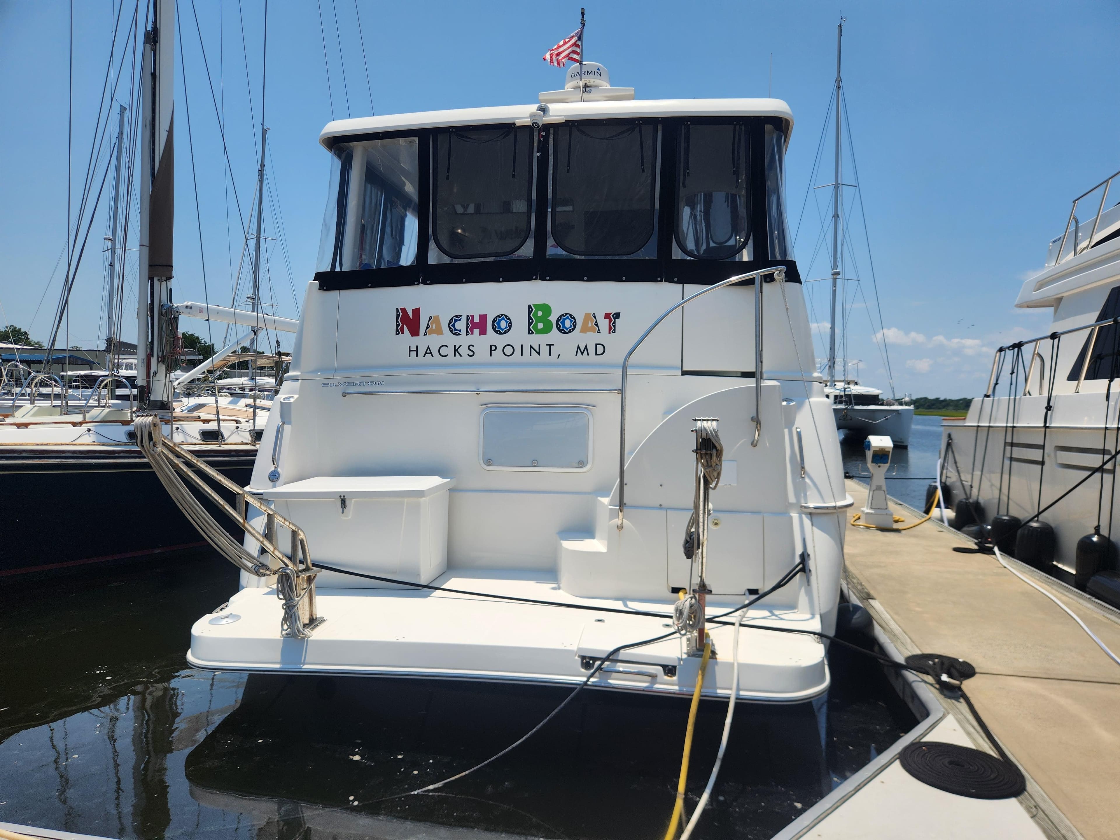 2000 Silverton 453 Motor Yacht docked at marina, labeled "Nacho Boat," Hacks Point, MD.