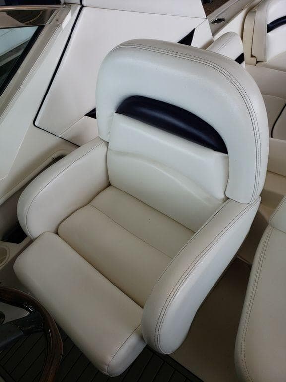 Luxurious white leather seat on 2008 Sea Ray 38 Sundancer boat.