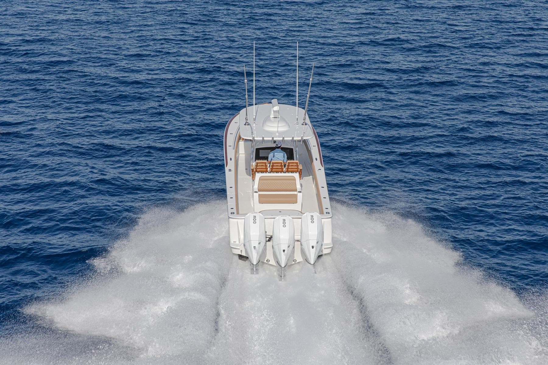 2026 Valhalla Boatworks V-37 cruising on open ocean, showcasing powerful engines.