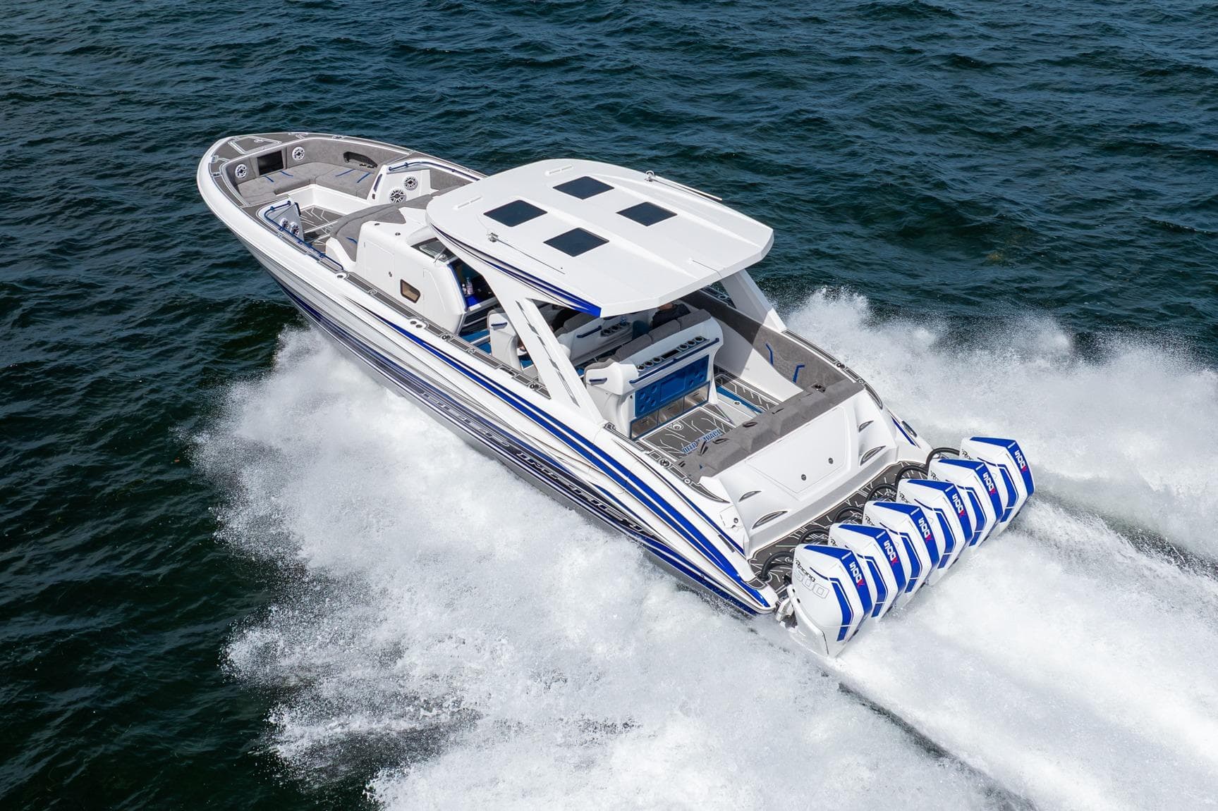 2027 Deep Impact 449 Sport boat speeding on open water with powerful engines.