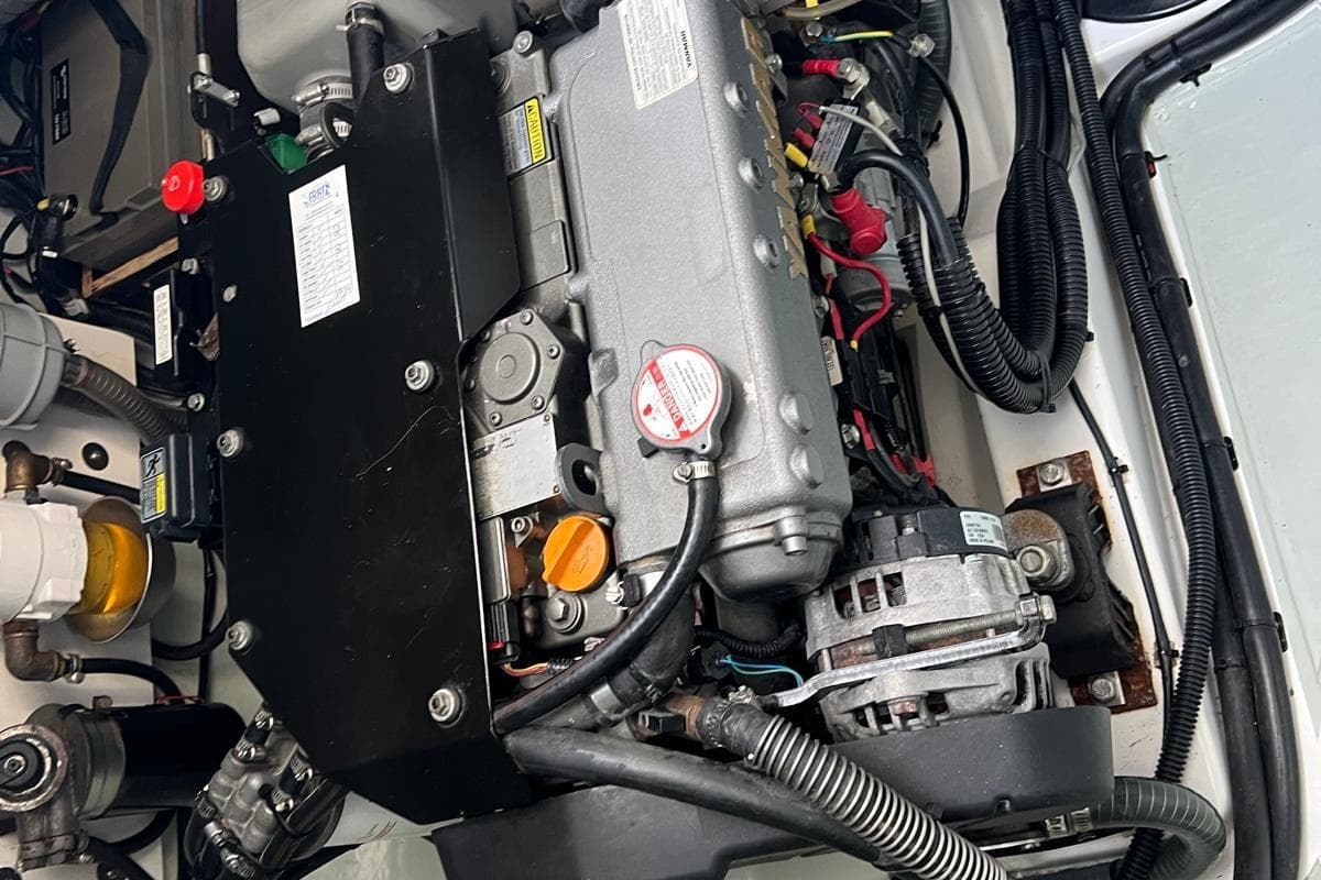 Engine compartment of a 2018 Leopard 45 yacht, showcasing detailed mechanical components.