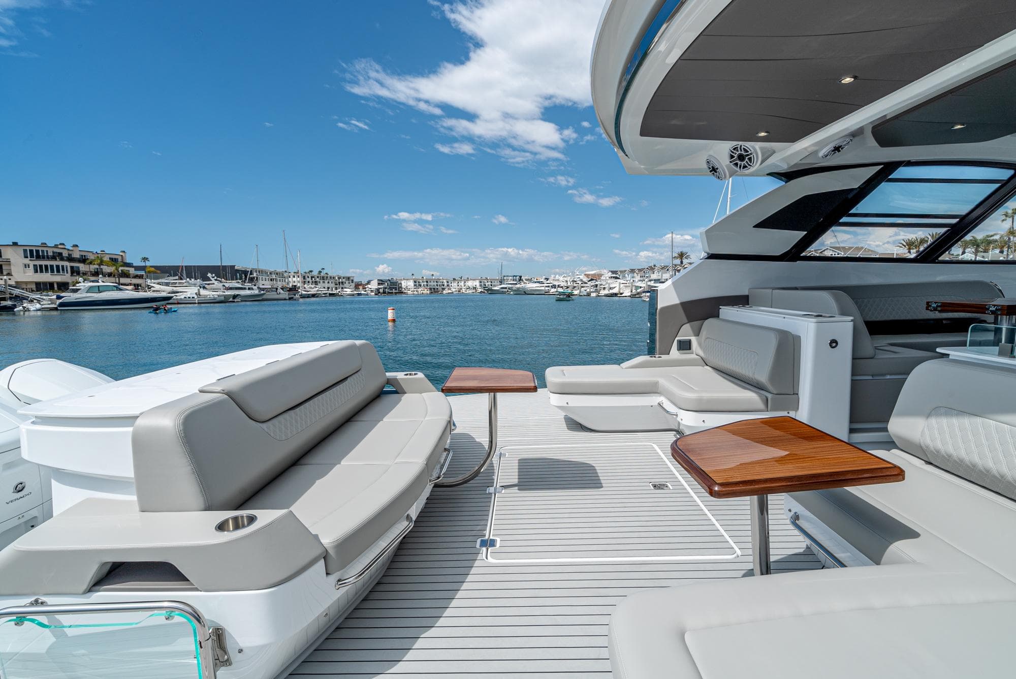 2024 Cruisers Yachts 50 GLS luxury yacht deck with seating and ocean view.