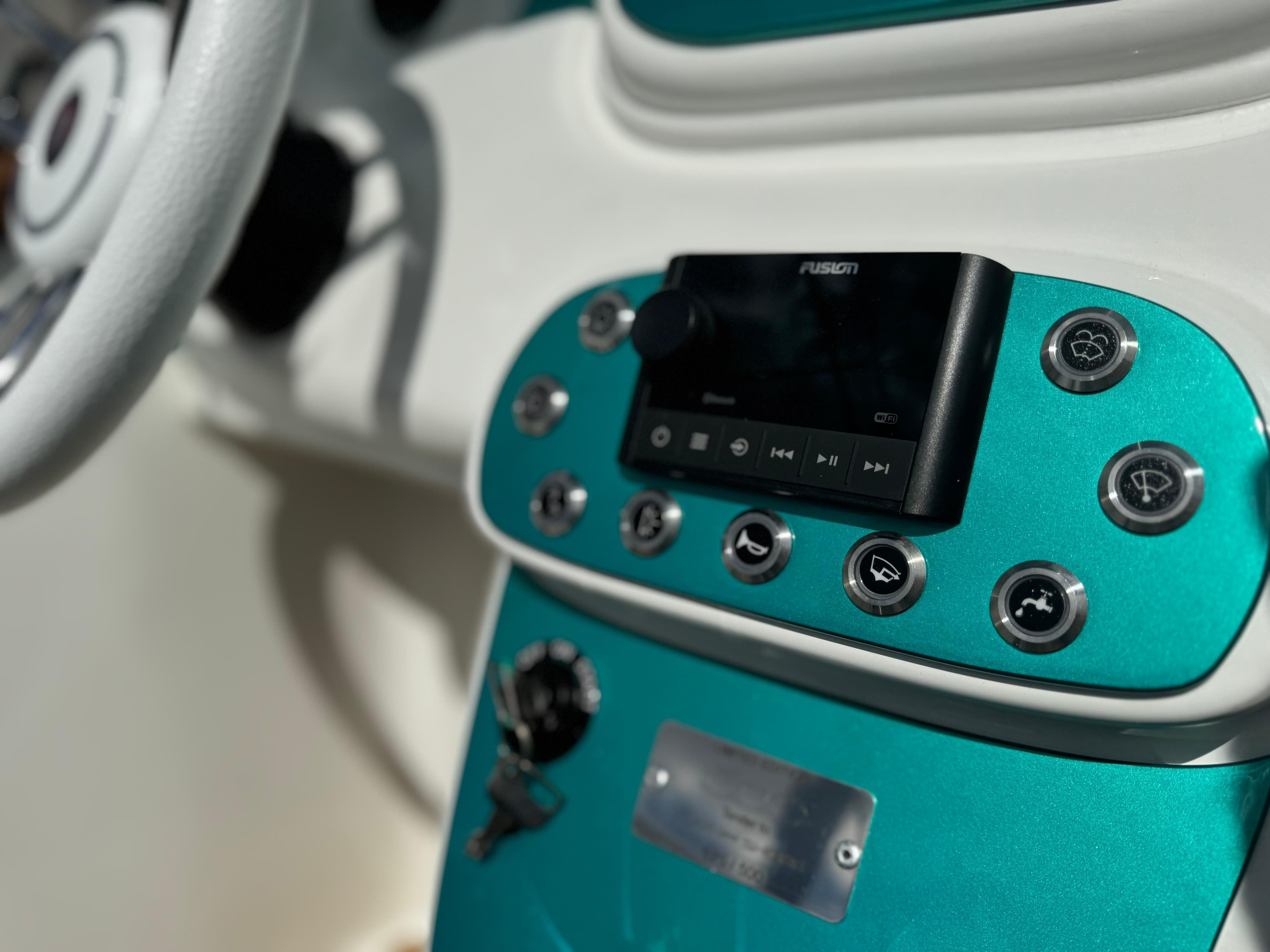 Dashboard of 2025 Car Off-shore Fiat 500 Classic with modern controls.